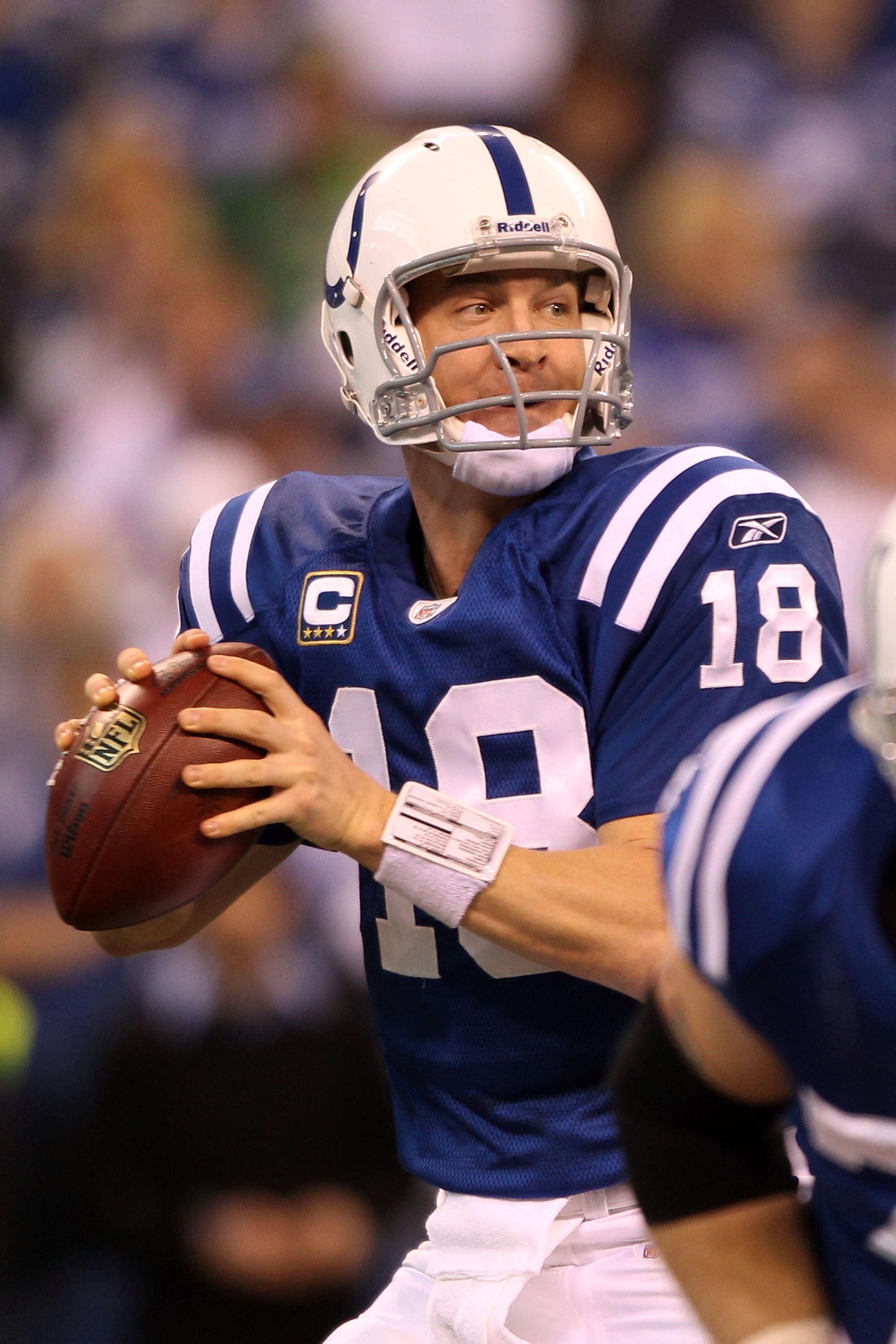 INDIANAPOLIS - JANUARY 24:  Quarterback Peyton Manning #18 of the Indianapolis Colts looks to pass the ball against the New York Jets during the AFC Championship Game at Lucas Oil Stadium on January 24, 2010 in Indianapolis, Indiana. The Colts defeated th