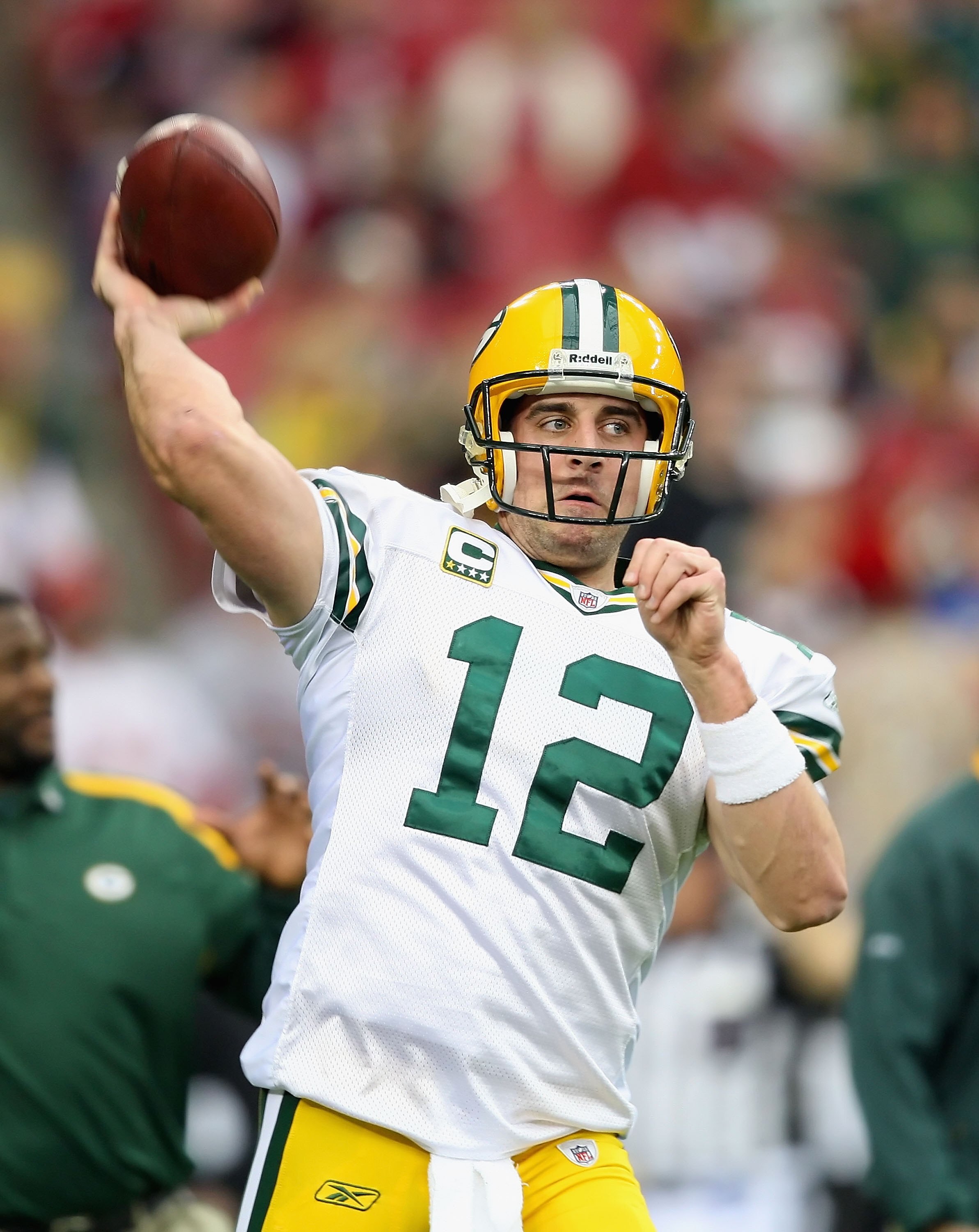 GLENDALE, AZ - JANUARY 10:  Quarterback Aaron Rodgers #12 of the Green Bay Packers warms up before the 2010 NFC wild-card playoff game against the Arizona Cardinals at the Universtity of Phoenix Stadium on January 10, 2010 in Glendale, Arizona.  The Cardi