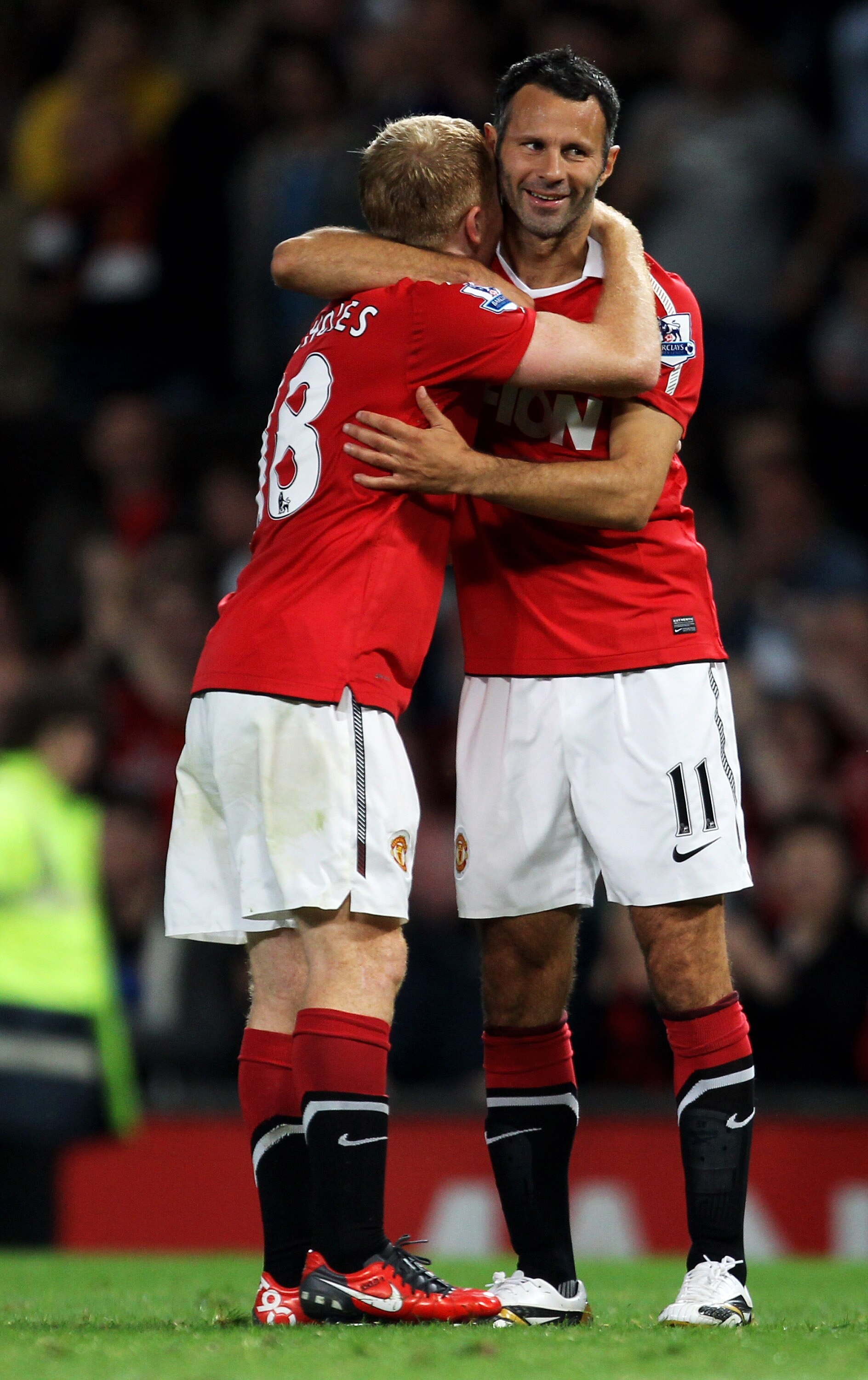 MANCHESTER, ENGLAND - AUGUST 16:  Ryan Giggs of Manchester United celebrates with team mate Paul Scholes after scoring his team's third goal during the Barclays Premier League match between Manchester United and Newcastle United at Old Trafford on August 