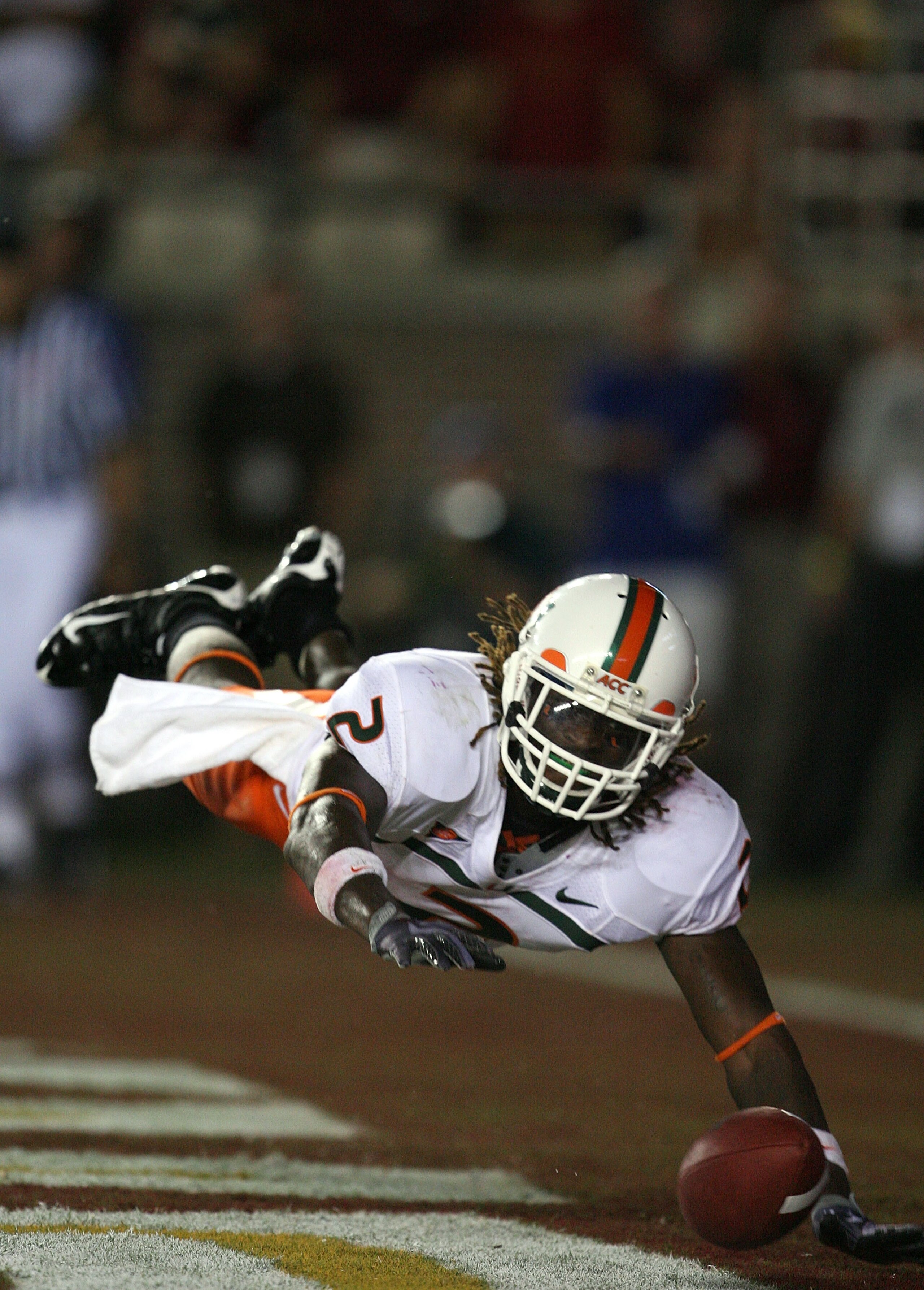TALLAHASSEE, FL - SEPTEMBER 07:  Running back Graig Cooper #2 of the Miami Hurricanes scores the game-winning touchdown against the Florida State Seminoles at Doak Campbell Stadium on September 7, 2009 in Tallahassee, Florida. Miami defeated Florida State