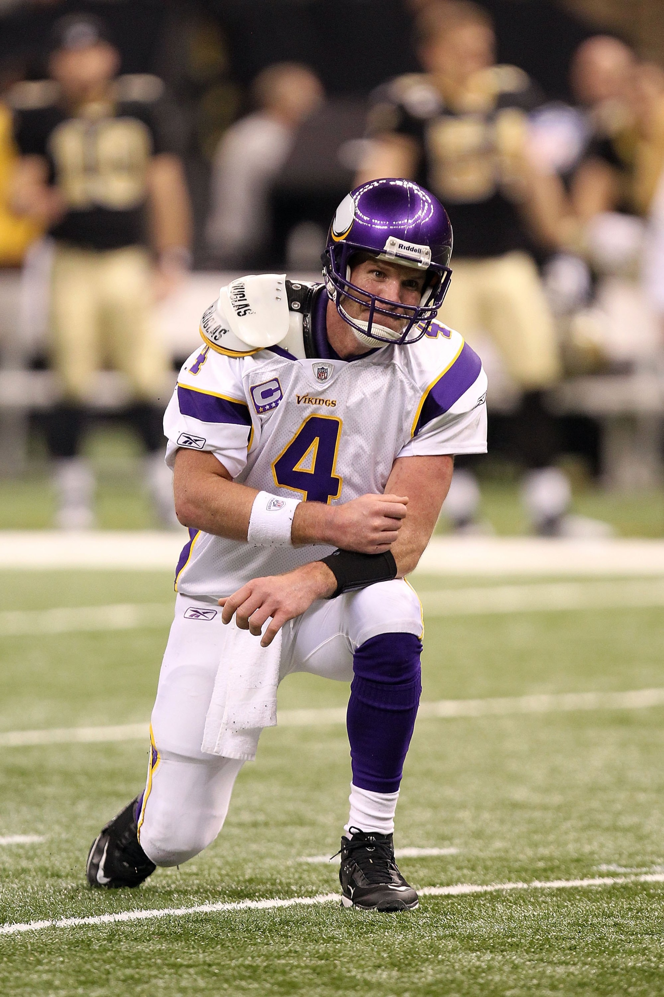 NEW ORLEANS - JANUARY 24:  Brett Favre #4 of the Minnesota Vikings picks himself off the turf against the New Orleans Saints during the NFC Championship Game at the Louisana Superdome on January 24, 2010 in New Orleans, Louisiana. The Saints won 31-28 in