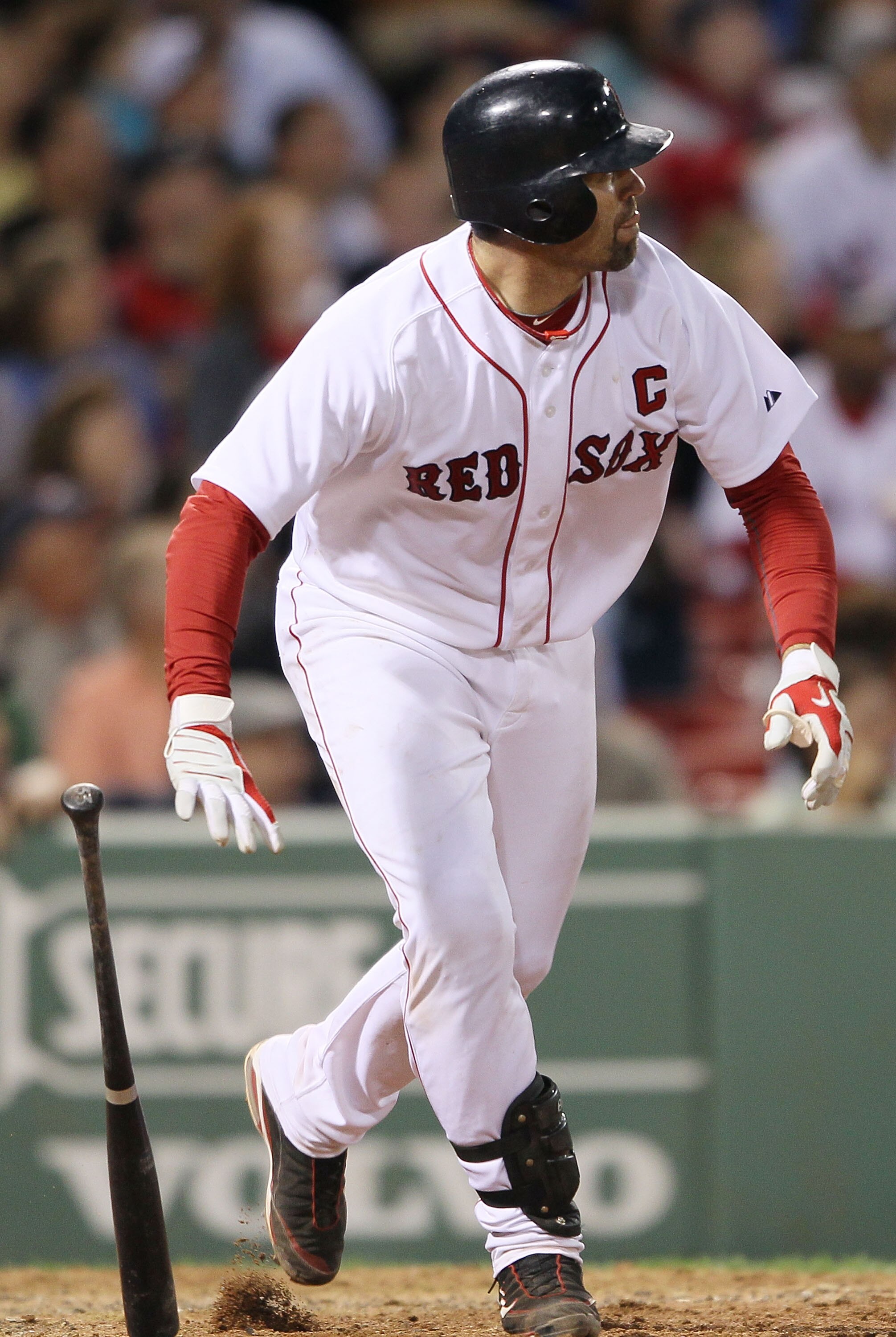 BOSTON - MAY 27:  Jason Varitek #33 of the Boston Red Sox hits an RBI double in the sixth inning against the Kansas City Royals on May 27, 2010 at Fenway Park in Boston, Massachusetts.  (Photo by Elsa/Getty Images)