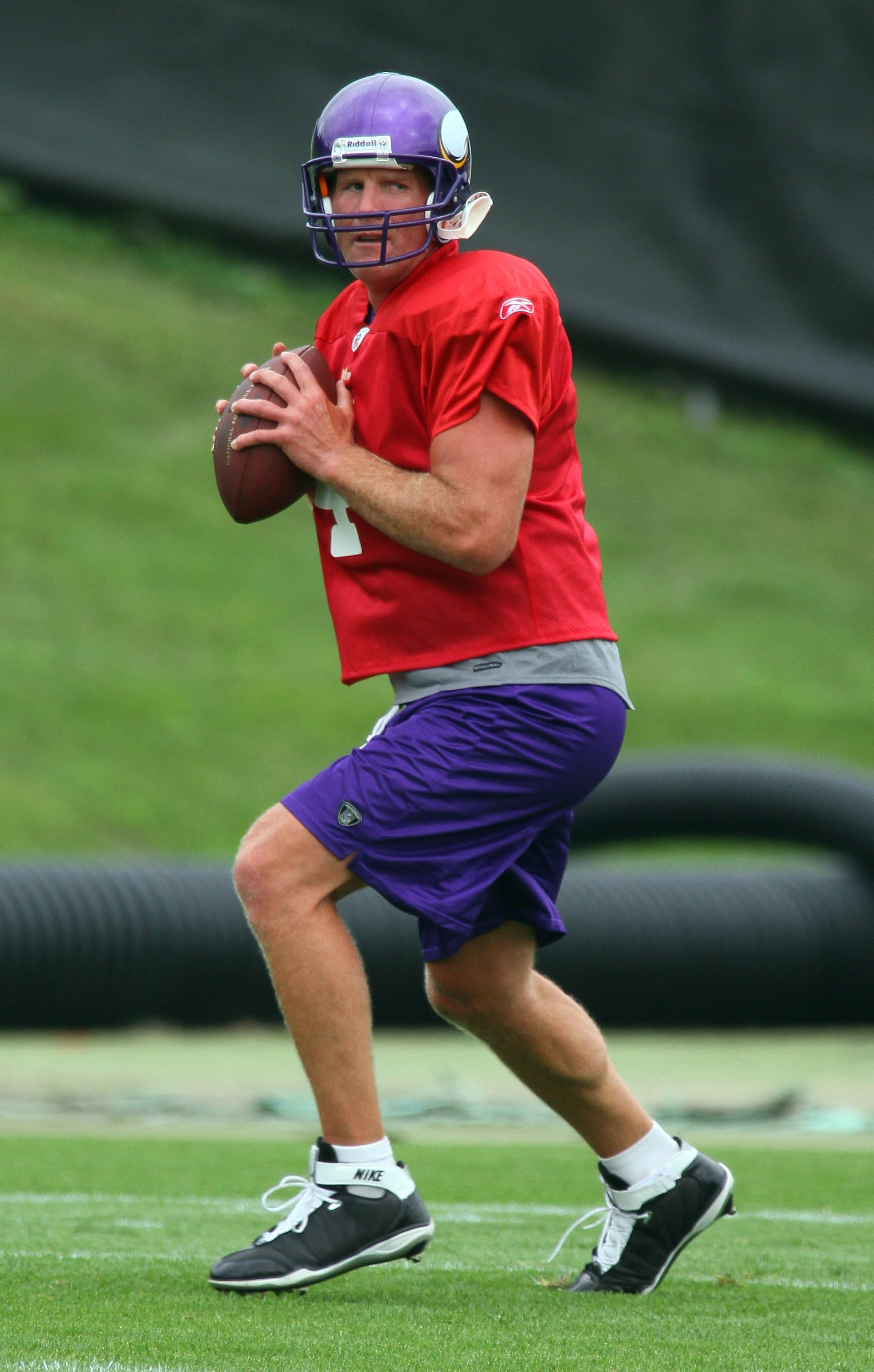 EDEN PRAIRIE, MN - AUGUST 18: Quarterback Brett Favre #4 of the Minnesota Vikings participates in his first morning practice since returning to Vikings Winter Park on August 18, 2010 in Eden Prairie, Minnesota. Favre injured his ankle last year and had be
