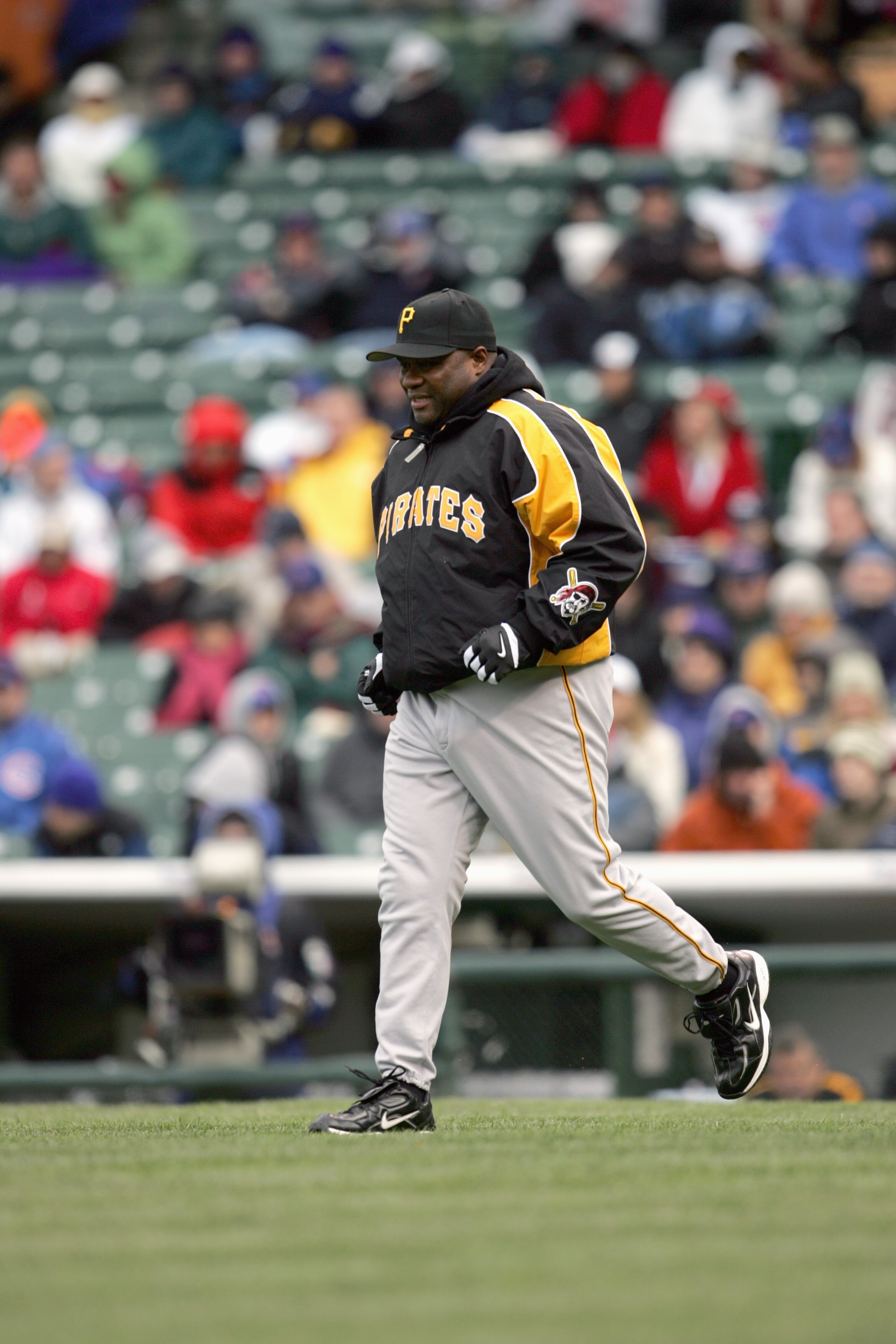 CHICAGO - APRIL 23:  Manager Lloyd McClendon of the Pittsburgh Pirates jogs to the mound during the game against the Chicago Cubs on April 23, 2005 at Wrigley Field in Chicago, Illinois. The Pirates defeated the Cubs 4-3. (Photo by Jonathan Daniel/Getty I