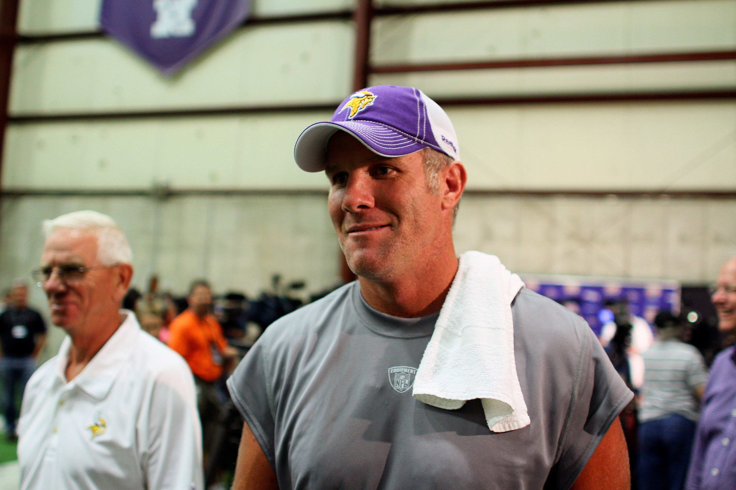 EDEN PRAIRIE, MN - AUGUST 18: Minnesota Vikings quarterback Brett Favre talks with the media following a press conference after the first morning practice since returning to Vikings Winter Park on August 18, 2010 in Eden Prairie, Minnesota. Favre injured 