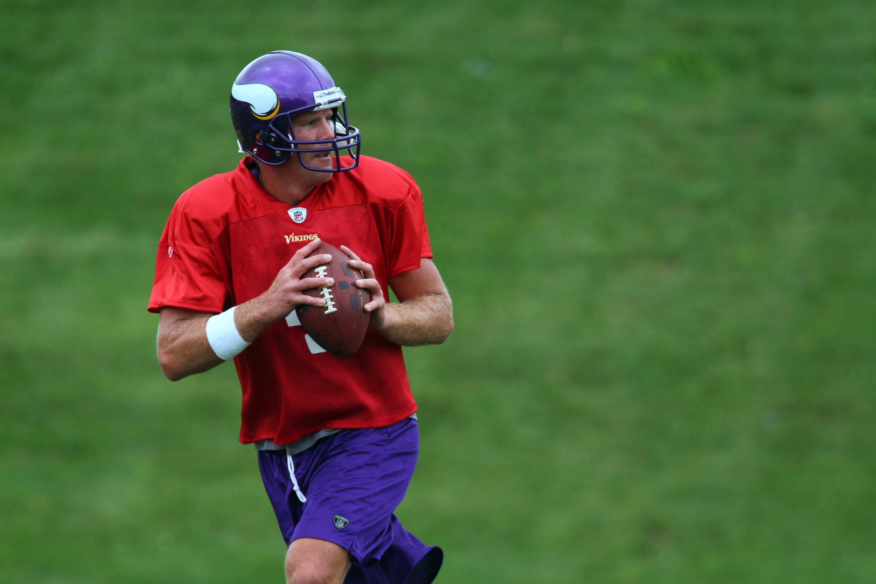 EDEN PRAIRIE, MN - AUGUST 18: Quarterback Brett Favre #4 of the Minnesota Vikings participates in his first morning practice since returning to Vikings Winter Park on August 18, 2010 in Eden Prairie, Minnesota. Favre injured his ankle last year and had be