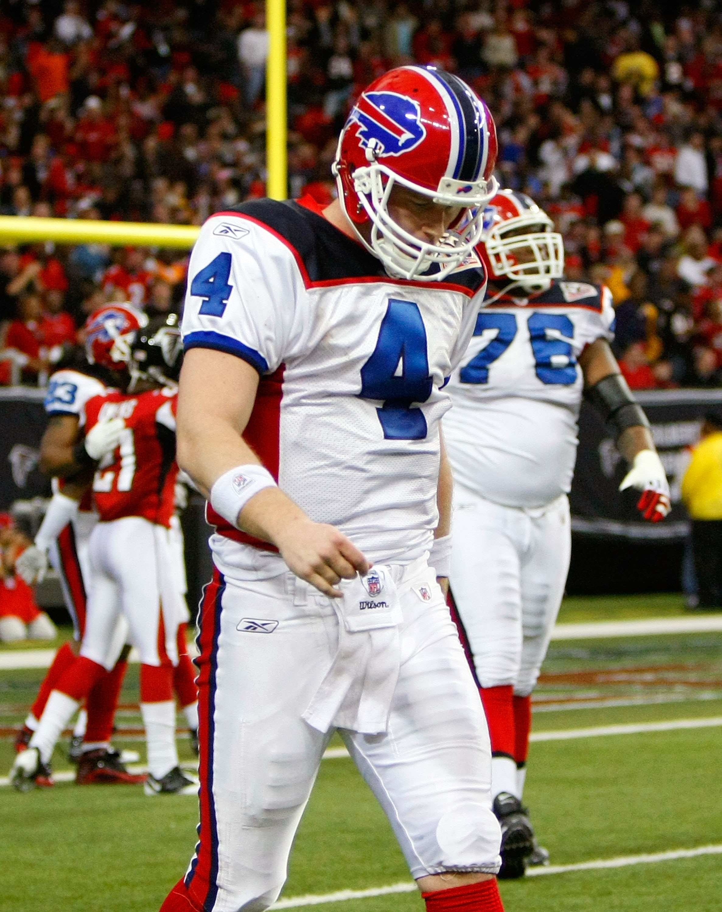 ATLANTA - DECEMBER 27:  Quarterback Brian Brohm #4 of the Buffalo Bills walks off the field after a turnover that resulted in a touchdown for the Atlanta Falcons at Georgia Dome on December 27, 2009 in Atlanta, Georgia.  (Photo by Kevin C. Cox/Getty Image