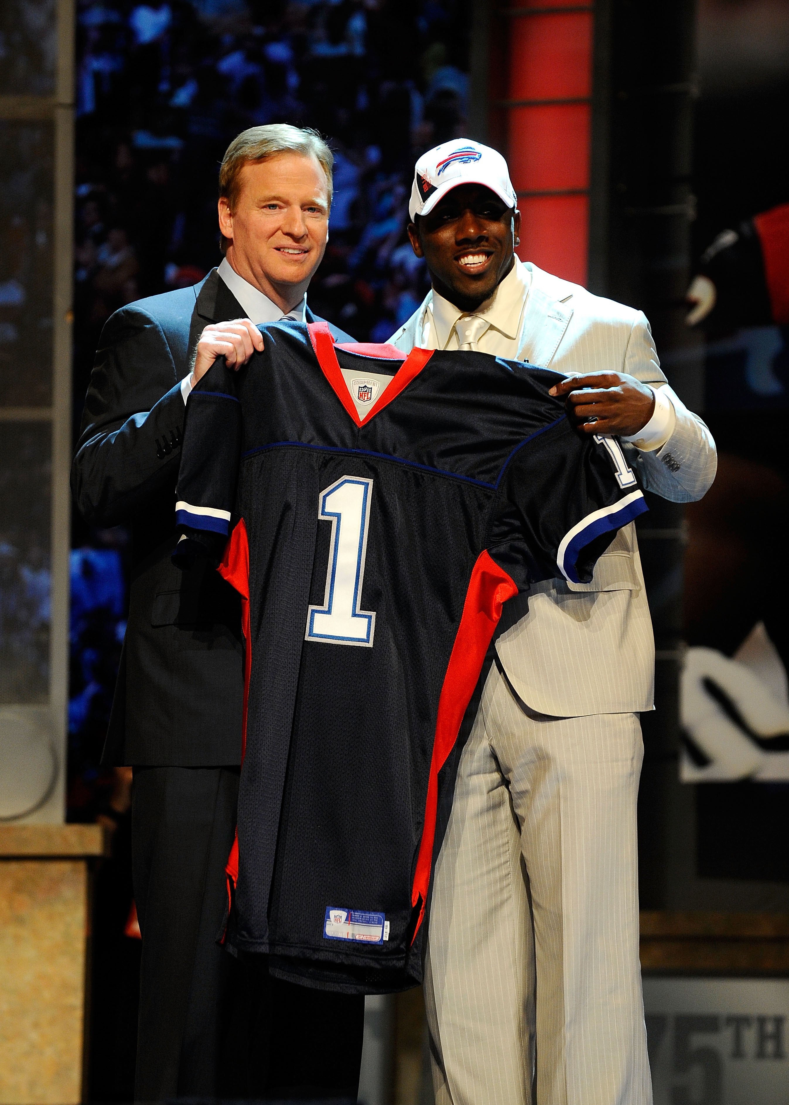 NEW YORK - APRIL 22:  C.J. Spiller from the Clemson Tigers poses with NFL Commissioner Roger Goodell as they hold up a Buffalo Bills jersey after Spiller was selected number 9 overall by the Bills during the first round of the 2010 NFL Draft at Radio City