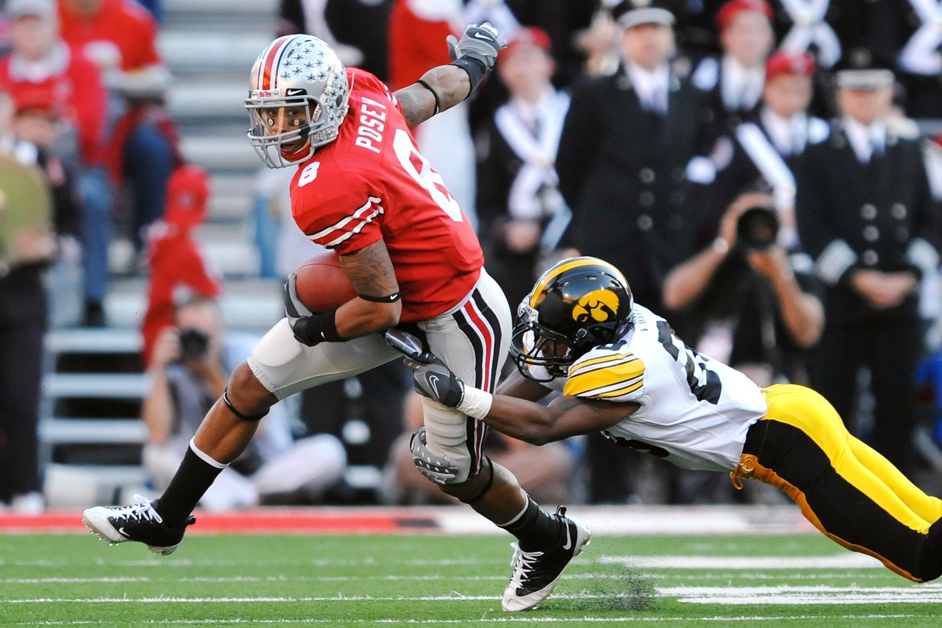 COLUMBUS, OH - NOVEMBER 14:  Wide receiver DeVier Posey #8 of the Ohio State Buckeyes runs with the ball against the Iowa Hawkeyes at Ohio Stadium on November 14, 2009 in Columbus, Ohio.  (Photo by Jamie Sabau/Getty Images)