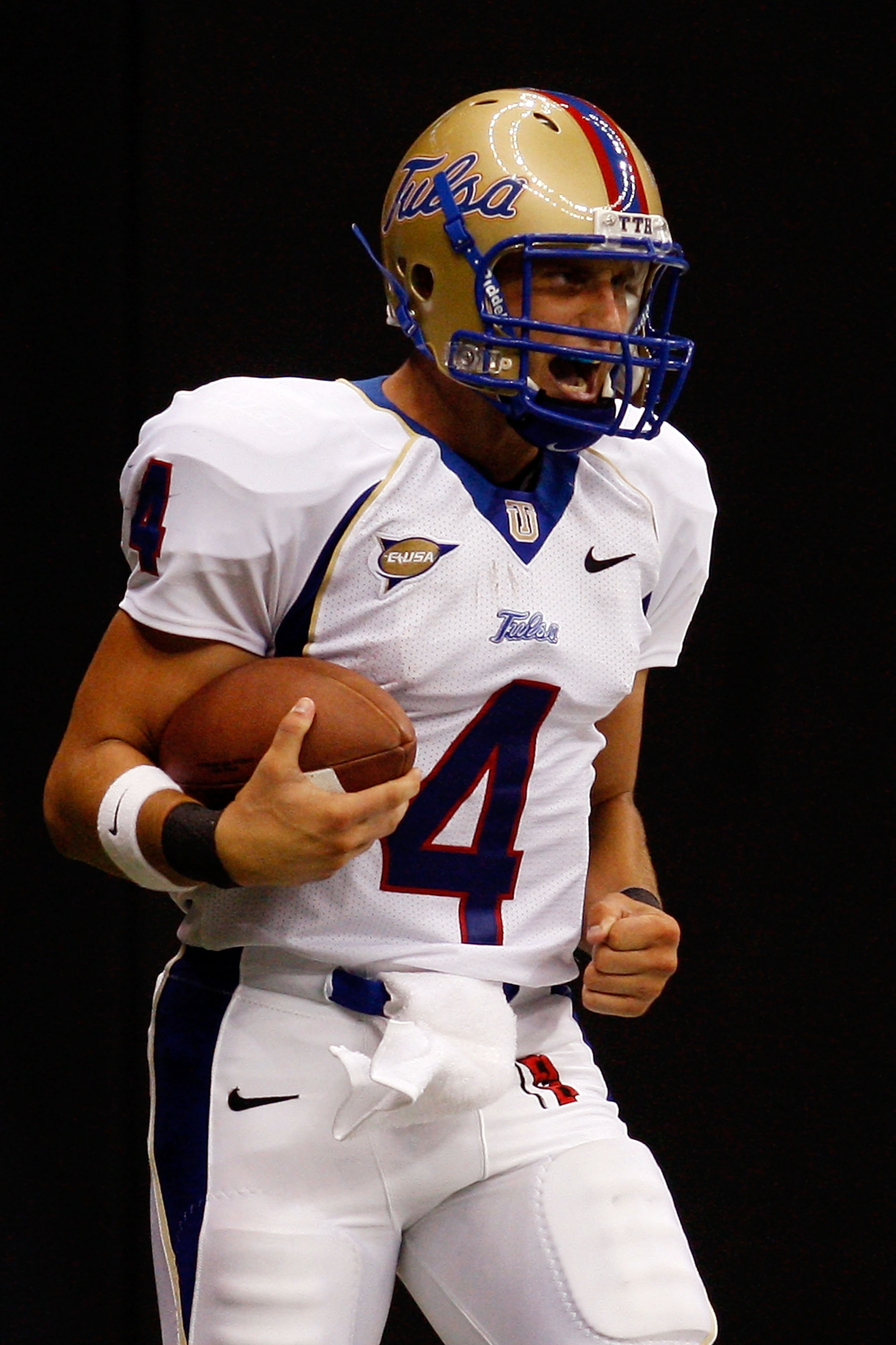 NEW ORLEANS - SEPTEMBER 04: G.J. Kinne #4 of the Tulsa Golden Hurricanes celebrates after a touchdown against the Tulane Green Wave at the Louisiana Superdome on September 4, 2009 in New Orleans, Louisiana. (Photo by Chris Graythen/Getty Images) NEW ORLEANS - SEPTEMBER 04: G.J. Kinne #4 of the Tulsa Golden Hurricanes celebrates after a touchdown against the Tulane Green Wave at the Louisiana Superdome on September 4, 2009 in New Orleans, Louisiana. (Photo by Chris Graythen/Getty Images)