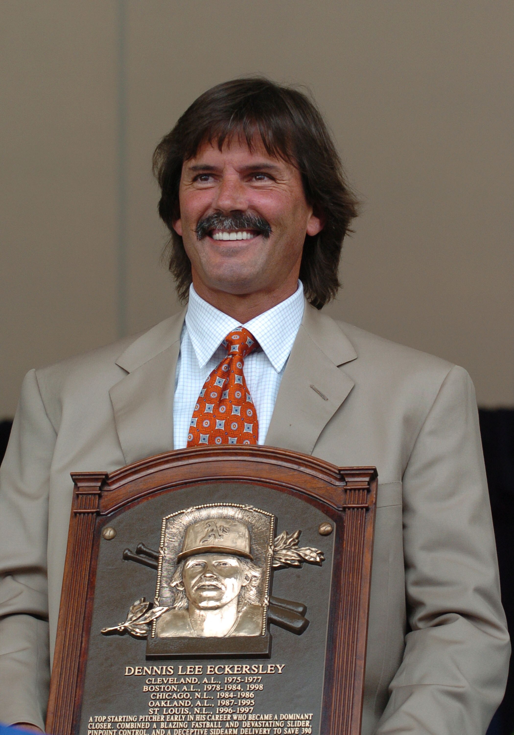 Pitcher Dennis Eckersley poses with his plaque at  2004  Baseball Hall of Fame induction ceremonies  July 25, 2004 in Cooperstown, New York. (Photo by A. Messerschmidt/Getty Images) *** Local Caption ***