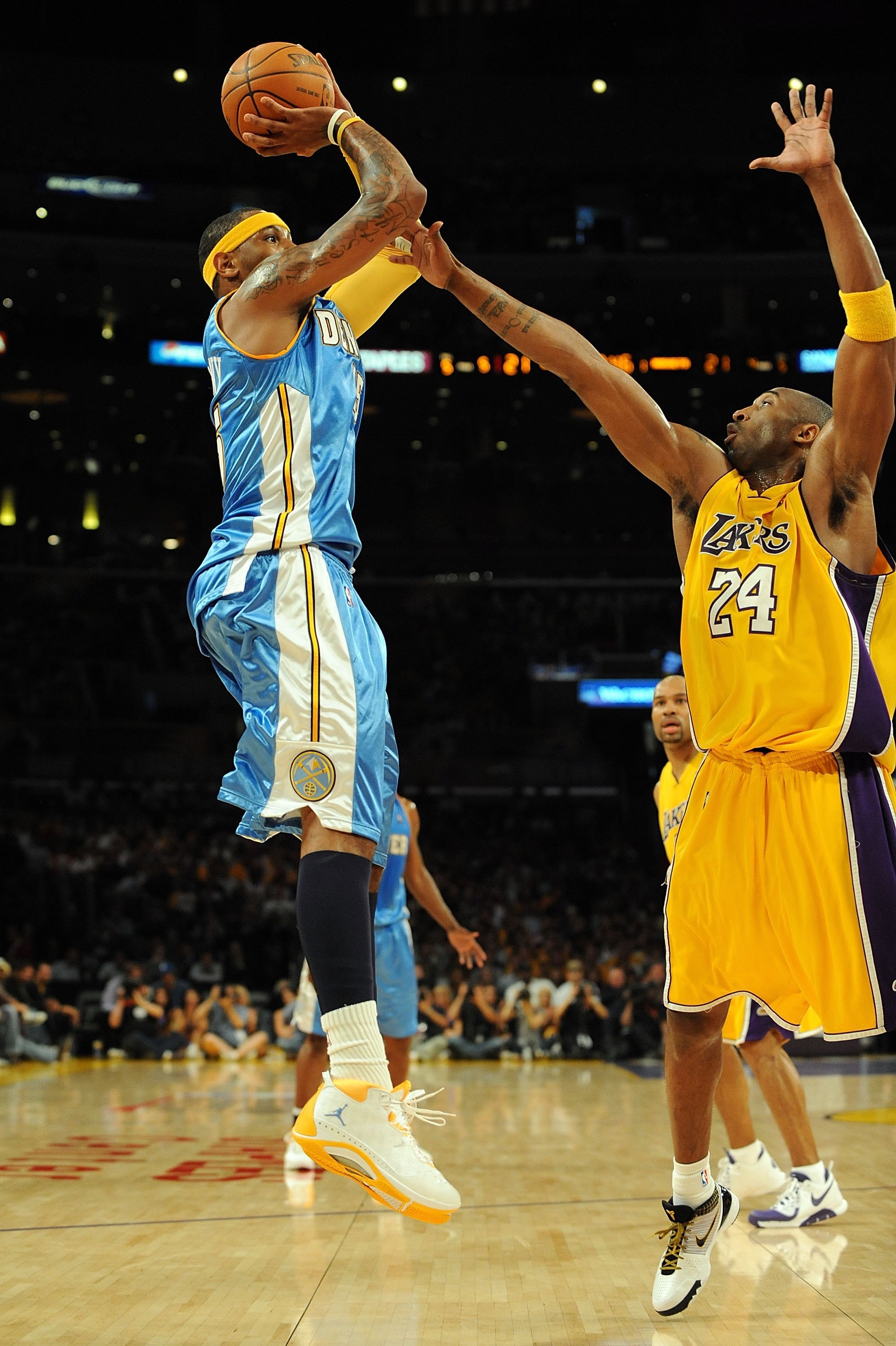 LOS ANGELES, CA - MAY 27:  Carmelo Anthony #15 of the Denver Nuggets shoots over Kobe Bryant #24 of the Los Angeles Lakers in Game Five of the Western Conference Finals during the 2009 NBA Playoffs at Staples Center on May 27, 2009 in Los Angeles, Califor