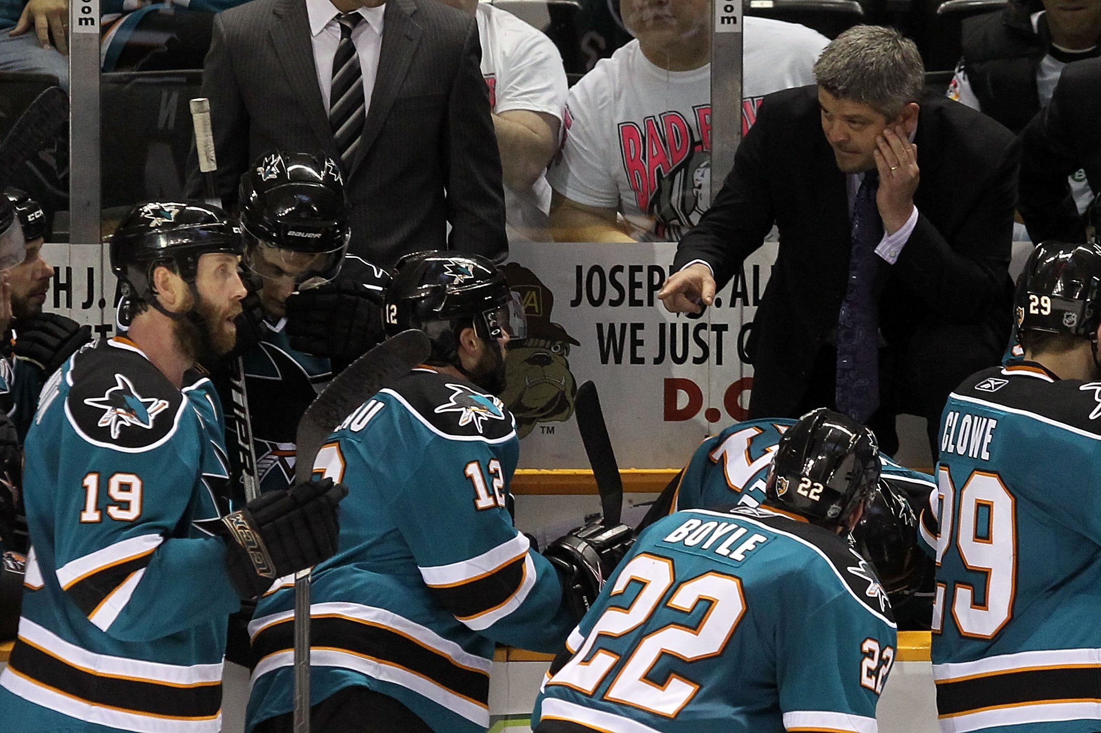SAN JOSE, CA - MAY 18:  (R) Head coach Todd McLellan of the San Jose Sharks talks with his team while taking on the Chicago Blackhawks in Game Two of the Western Conference Finals during the 2010 NHL Stanley Cup Playoffs at HP Pavilion on May 18, 2010 in