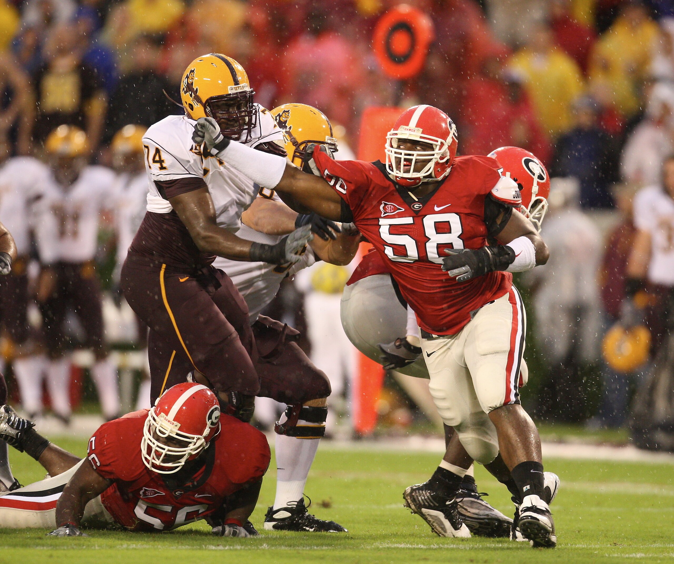 ATHENS, GA - SEPTEMBER 26: Demarcus Dobbs #58 of the Georgia Bulldogs rushes against Tom Njunge #74 of the Arizona State Sun Devils at Sanford Stadium on September 26, 2009 in Athens, Georgia. (Photo by Scott Cunningham/Getty Images)