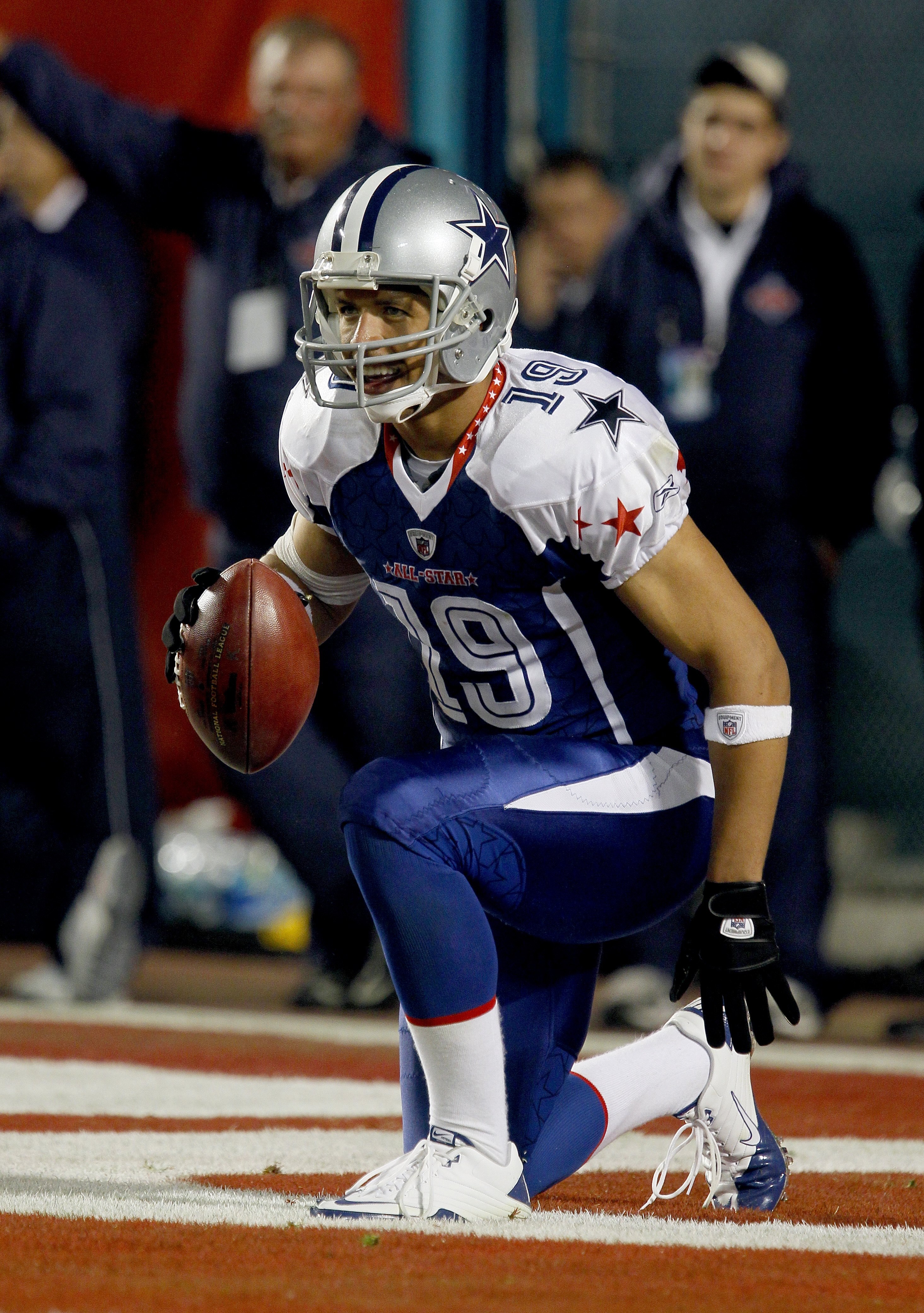 MIAMI GARDENS, FL - JANUARY 31:  Miles Austin #19 of the NFC's Dallas Cowboys celebrates in the end zone during the 2010 AFC-NFC Pro Bowl game at Sun Life Stadium on January 31, 2010 in Miami Gardens, Florida. The AFC defeated the NFC 41-34. (Photo by Sco