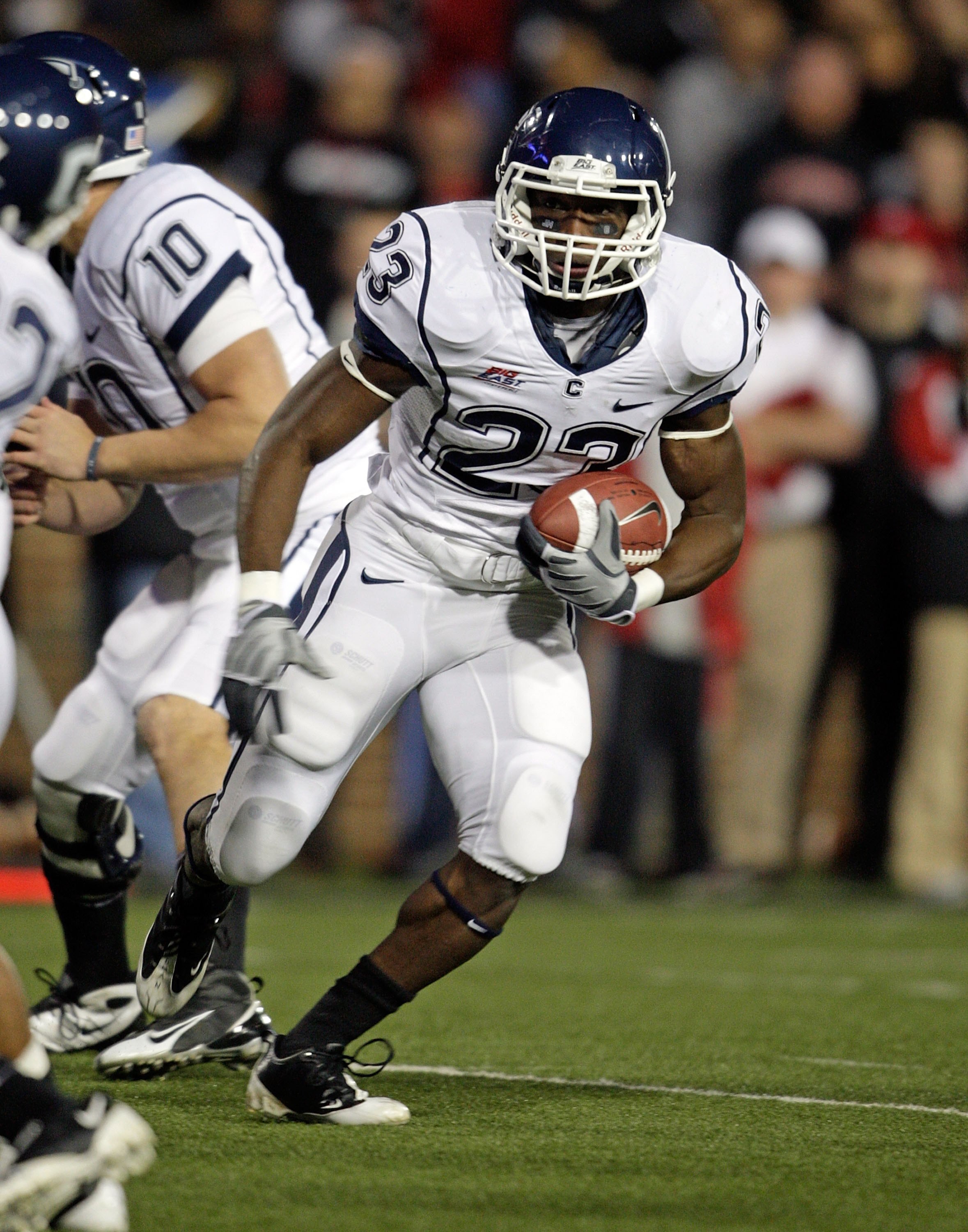 CINCINNATI - NOVEMBER 07:  Jordan Todman #23 of the Connecticut Huskies runs with the ball against the Cincinnati Bearcats during the Big East Conference game at Nippert Stadium on November 7, 2009 in Cincinnati, Ohio.  (Photo by Andy Lyons/Getty Images)