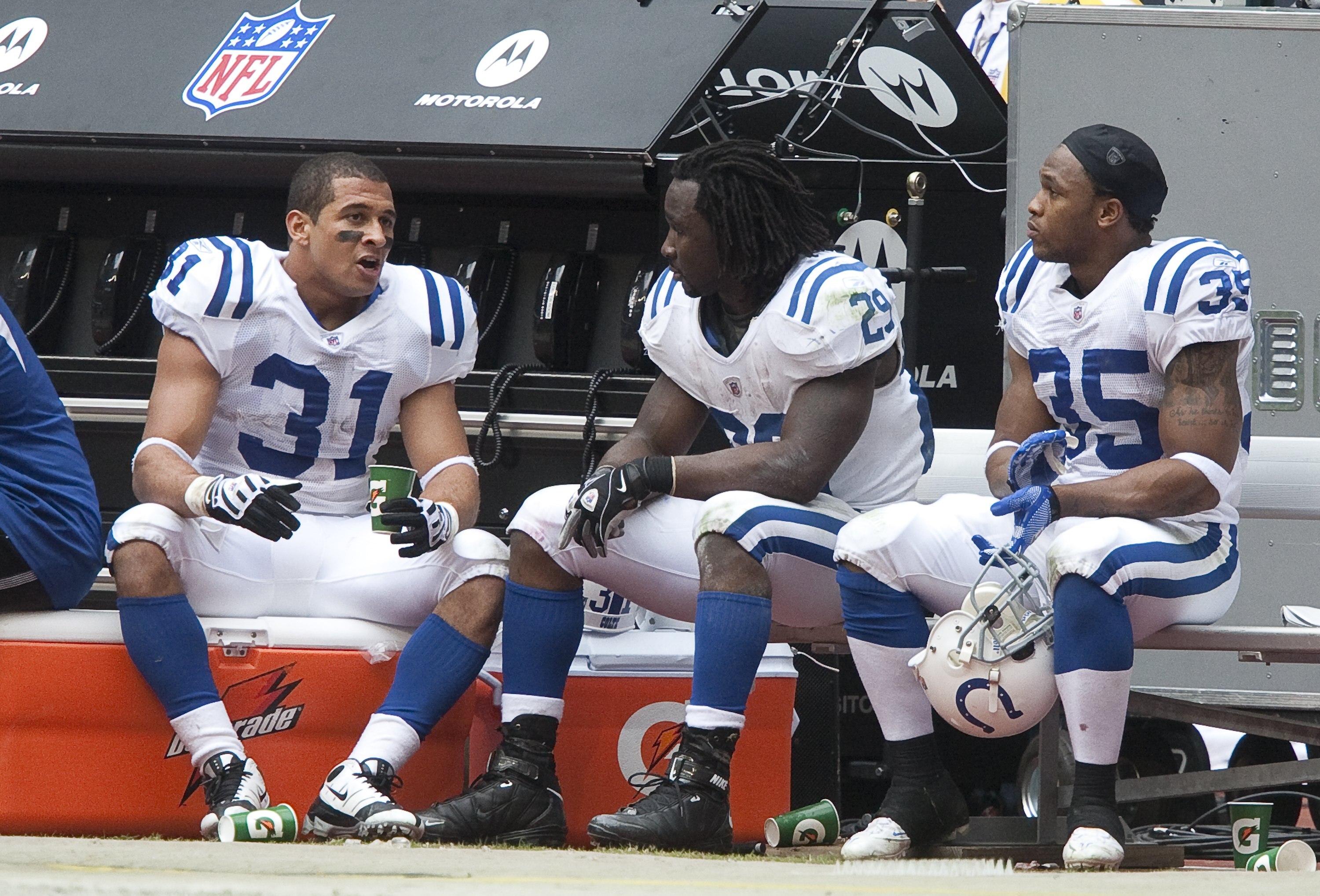 HOUSTON - NOVEMBER 29:  Running backs Donald Brown #31, Joseph Addai #29 and Chad Simpson #35 talk on the bench at Reliant Stadium on November 29, 2009 in Houston, Texas.  (Photo by Bob Levey/Getty Images)