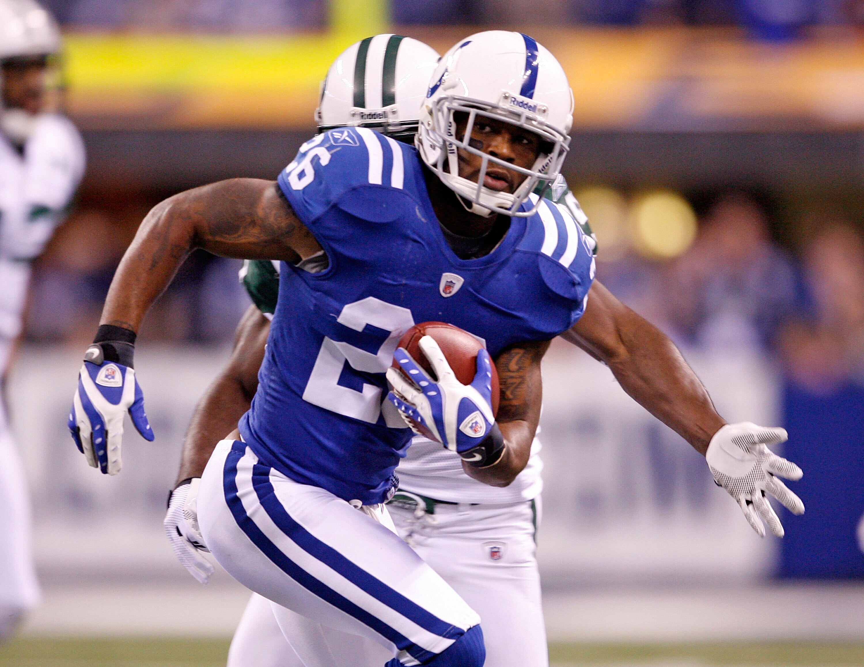 INDIANAPOLIS - DECEMBER 27:  Kelvin Hayden #26 of the Indianapolis Colts runs with the ball after intercepting a pass during the NFL game against the New York Jets at Lucas Oil Stadium on December 27, 2009 in Indianapolis, Indiana.  (Photo by Andy Lyons/G
