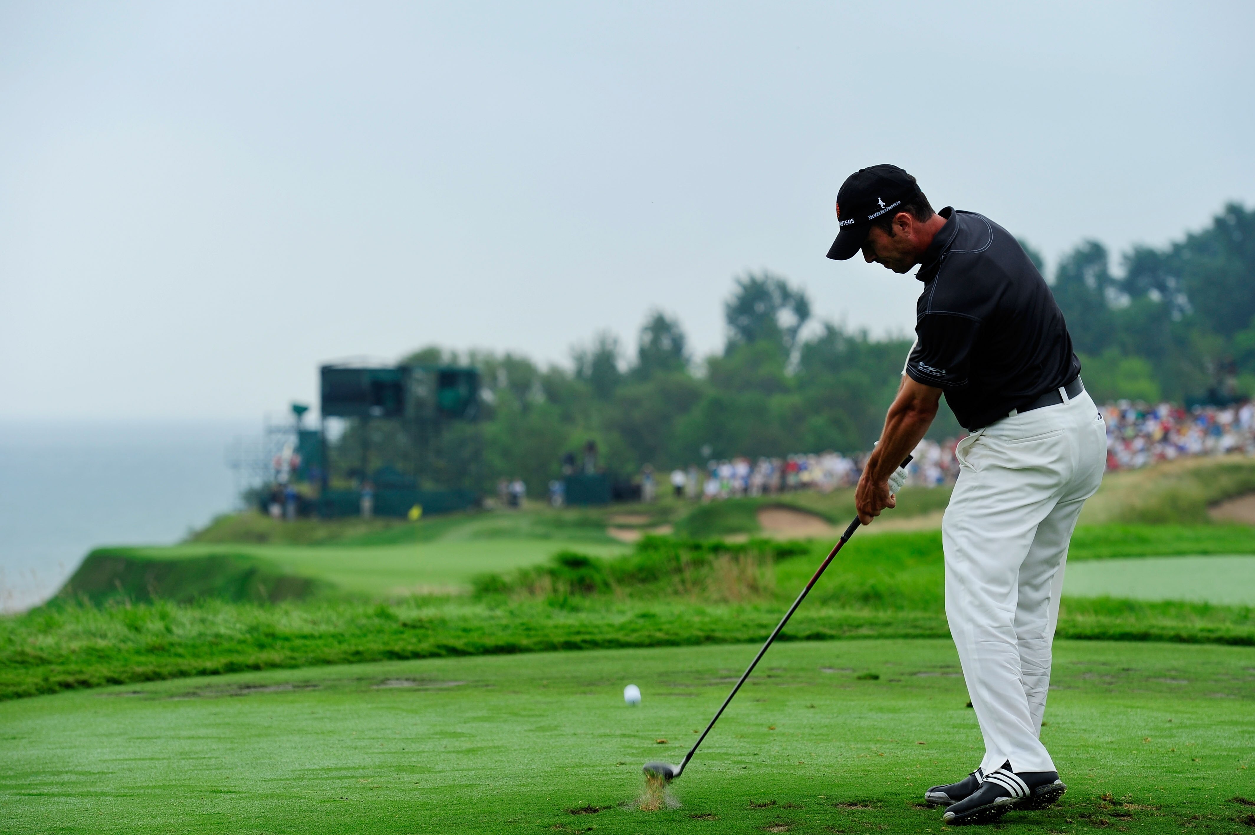 KOHLER, WI - AUGUST 13:  Mike Weir of Canada hits his tee shot on the 17th hole during the continuation of the first round of the 92nd PGA Championship on the Straits Course at Whistling Straits on August 13, 2010 in Kohler, Wisconsin.  (Photo by Stuart F