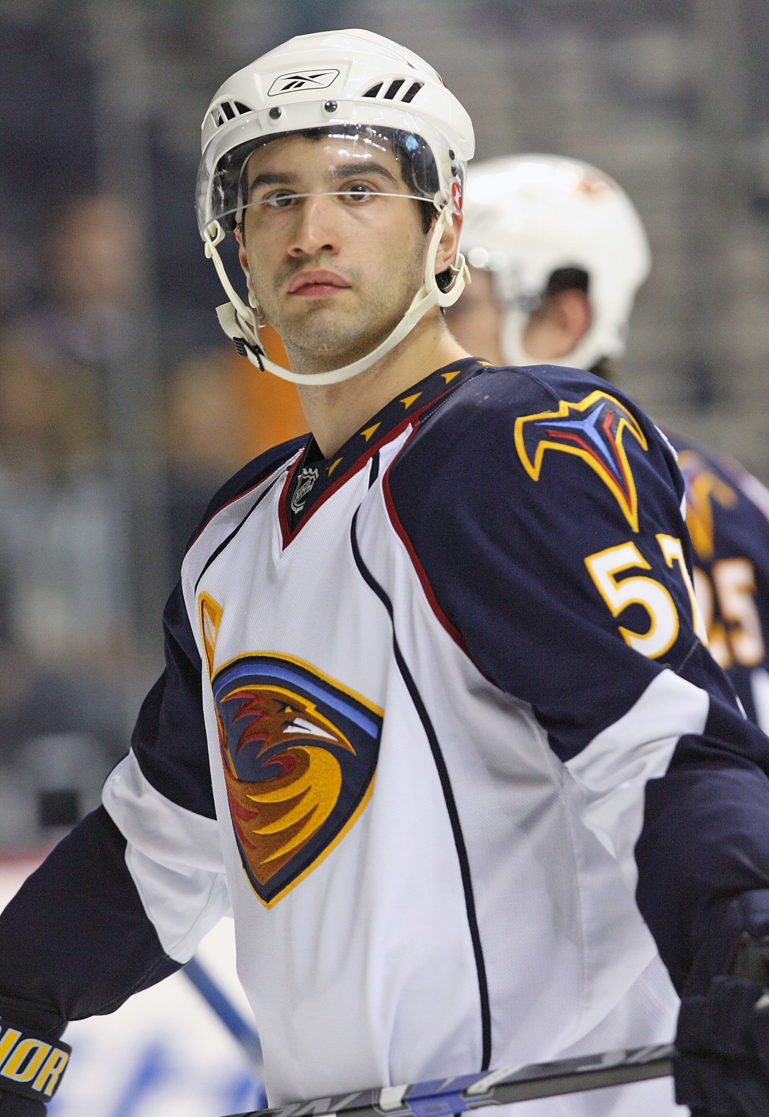 NASHVILLE, TN - SEPTEMBER 17: Center Angelo Esposito #57 of the Atlanta Thrashers skates during an NHL pre-season game at the Sommet Center on September 17, 2009 in Nashville, Tennessee.  (Photo by Frederick Breedon/Getty Images)