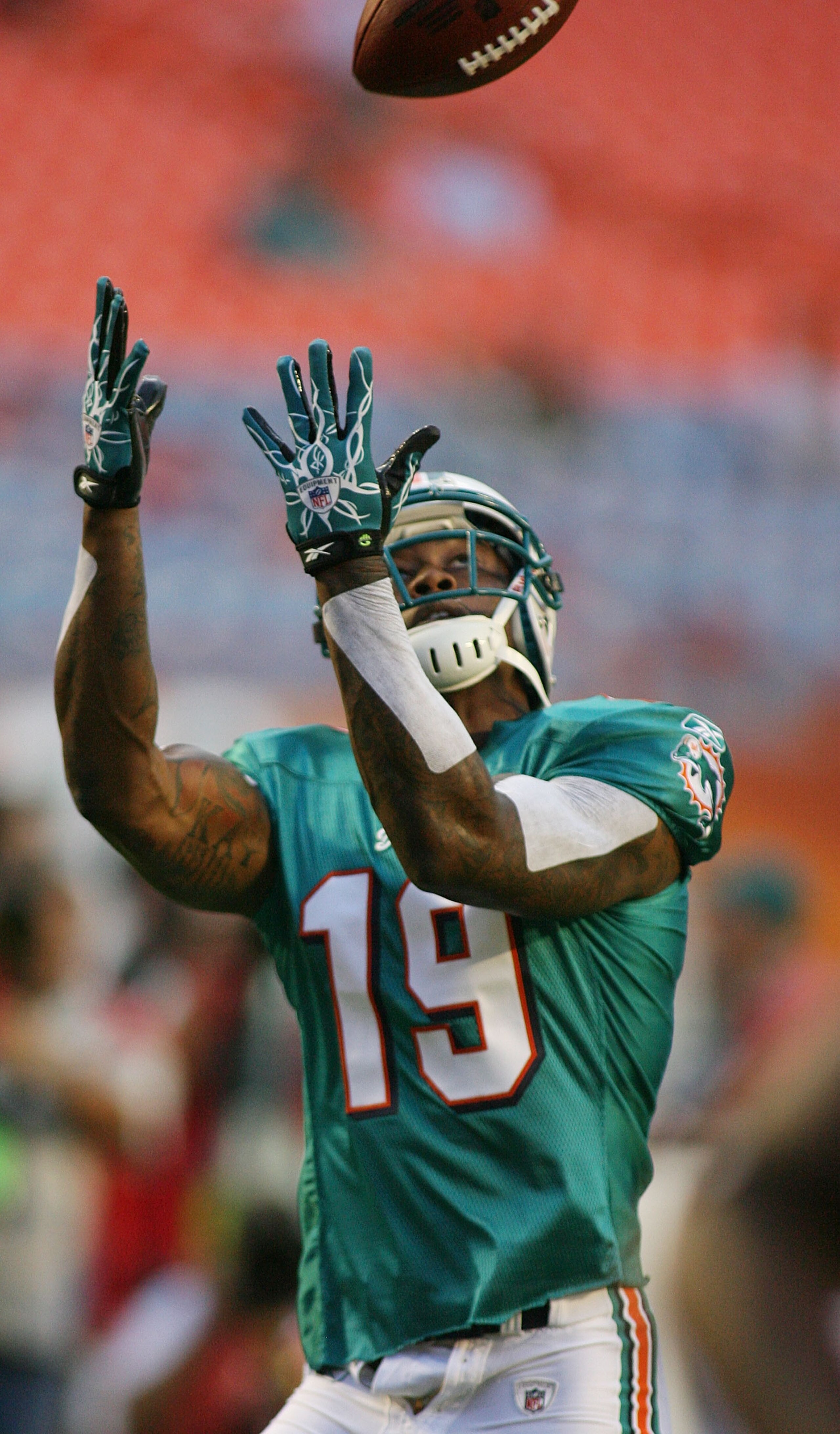 MIAMI - AUGUST 14:  Wide Receiver Brandon Marshall #19 of the Miami Dolphins warms up prior to playing the Tampa Bay Buccaneers in a preseason game at Sun Life Stadium on August 14, 2010 in Miami, Florida.  (Photo by Marc Serota/Getty Images)