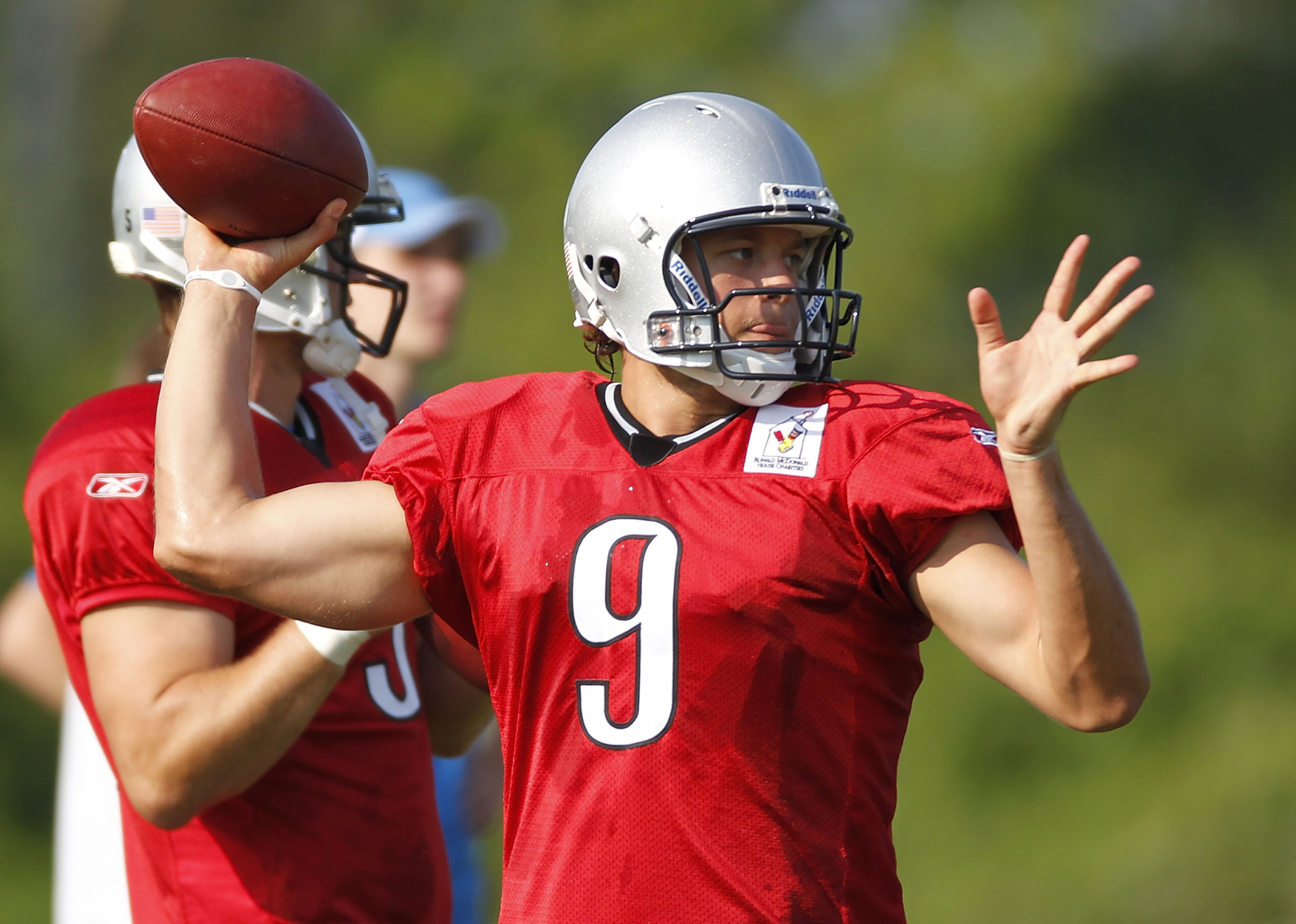 ALLEN PARK, MI - AUGUST 05:  Matthew Stafford #9 of the Detroit Lions throws a pass during training camp at the Detroit Lions Headquarters and Training Facility on August 5, 2010 in Allen Park, Michigan.  (Photo by Gregory Shamus/Getty Images)