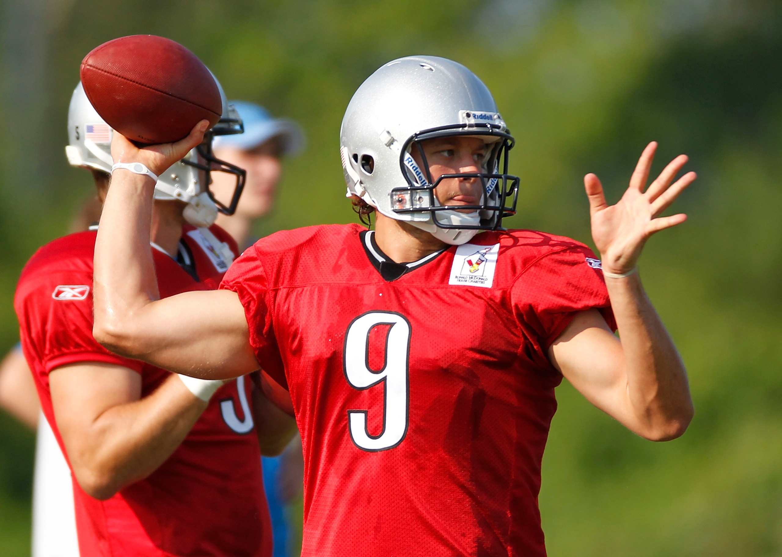 ALLEN PARK, MI - AUGUST 05:  Matthew Stafford #9 of the Detroit Lions throws a pass during training camp at the Detroit Lions Headquarters and Training Facility on August 5, 2010 in Allen Park, Michigan.  (Photo by Gregory Shamus/Getty Images)