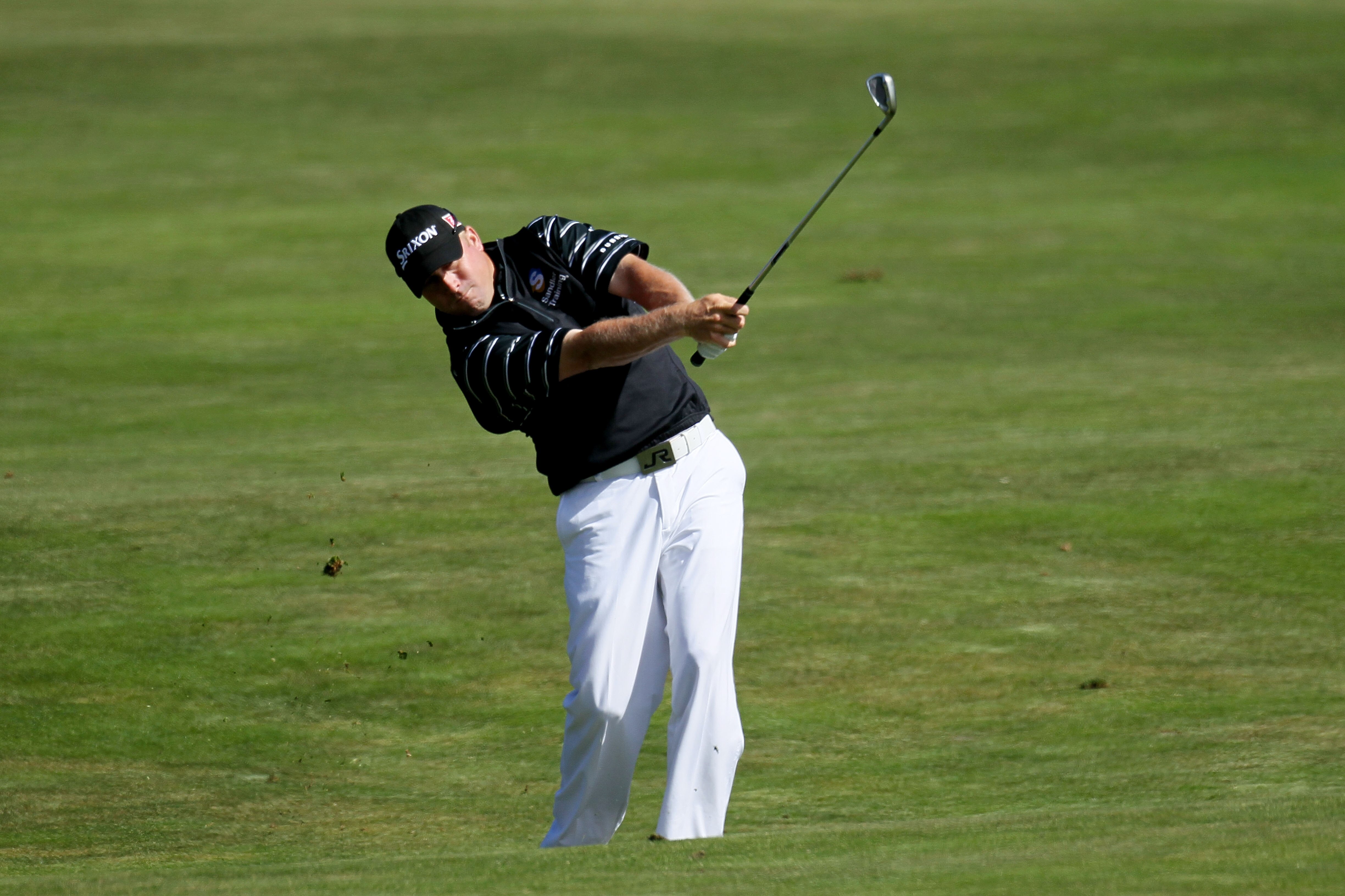 PEBBLE BEACH, CA - JUNE 17:  John Rollins plays his second shot on the 15th hole during the first round of the 110th U.S. Open at Pebble Beach Golf Links on June 17, 2010 in Pebble Beach, California.  (Photo by Stephen Dunn/Getty Images)