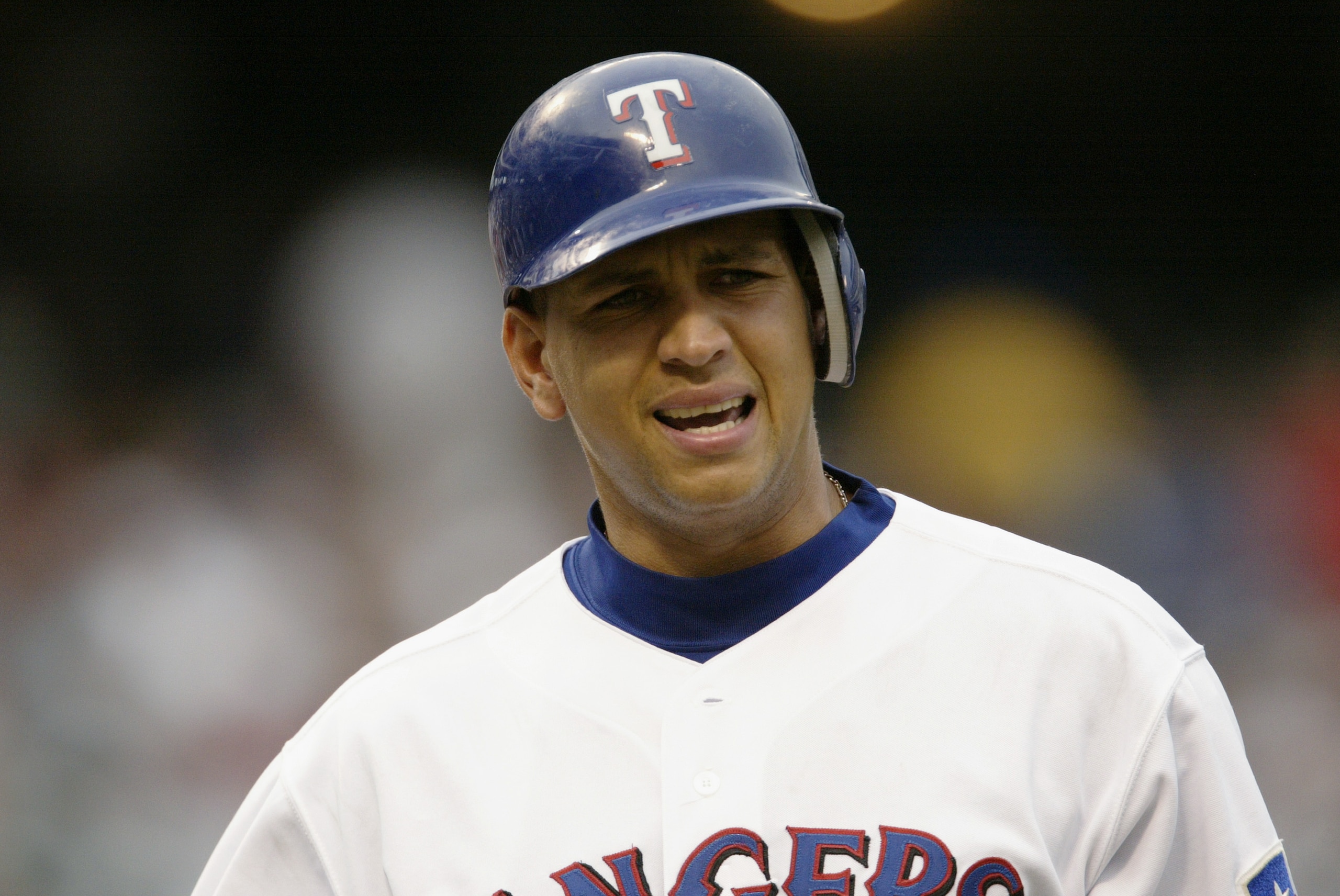 ARLINGTON, TEXAS - JULY 30:  (FILE PHOTO) Shortstop Alex Rodriguez  #3 of the Texas Rangers complains as he walks back to the dugout after getting called out on strikes against the Boston Red Sox in the first inning of the American League game at the Ball