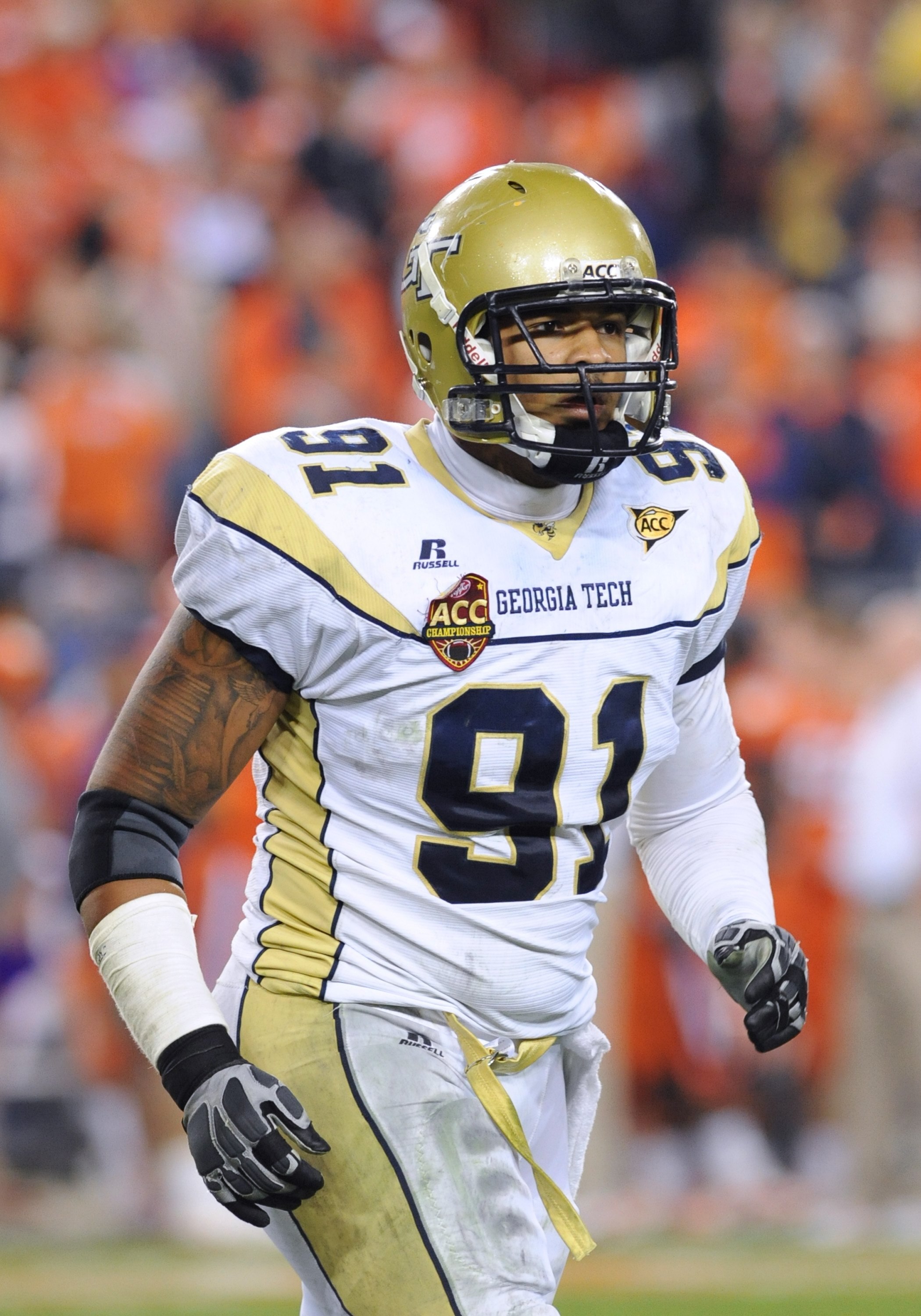 TAMPA, FL - NOVEMBER 28: Defensive end Derrick Morgan #91 of the Georgia Tech Yellow Jackets sets for play against the Clemson Tigers in the 2009 ACC Football Championship Game December 5, 2009 at Raymond James Stadium in Tampa, Florida.  (Photo by Al Mes
