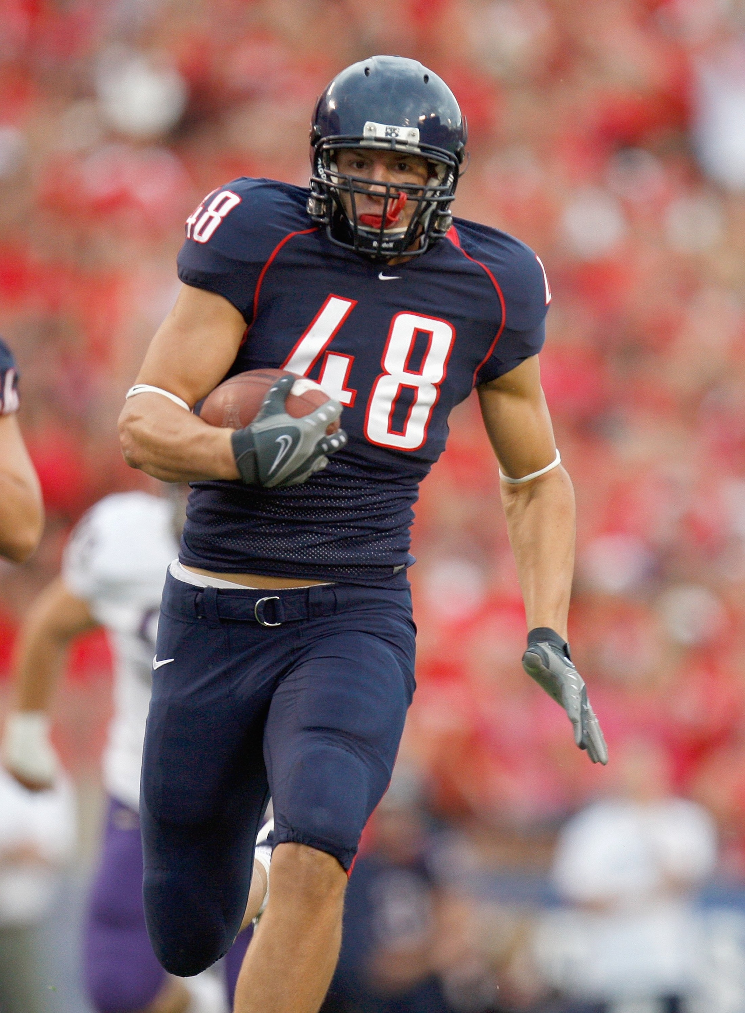TUSCON - OCTOBER 4: Rob Gronkowski #48 of the Arizona Wildcats carries the ball during the game against the Washington Huskies on October 4, 2008 at Arizona Stadium in Tucson, Arizona. (Photo by: Gregory Shamus/Getty Images) TUSCON - OCTOBER 4: Rob Gronkowski #48 of the Arizona Wildcats carries the ball during the game against the Washington Huskies on October 4, 2008 at Arizona Stadium in Tucson, Arizona. (Photo by: Gregory Shamus/Getty Images)