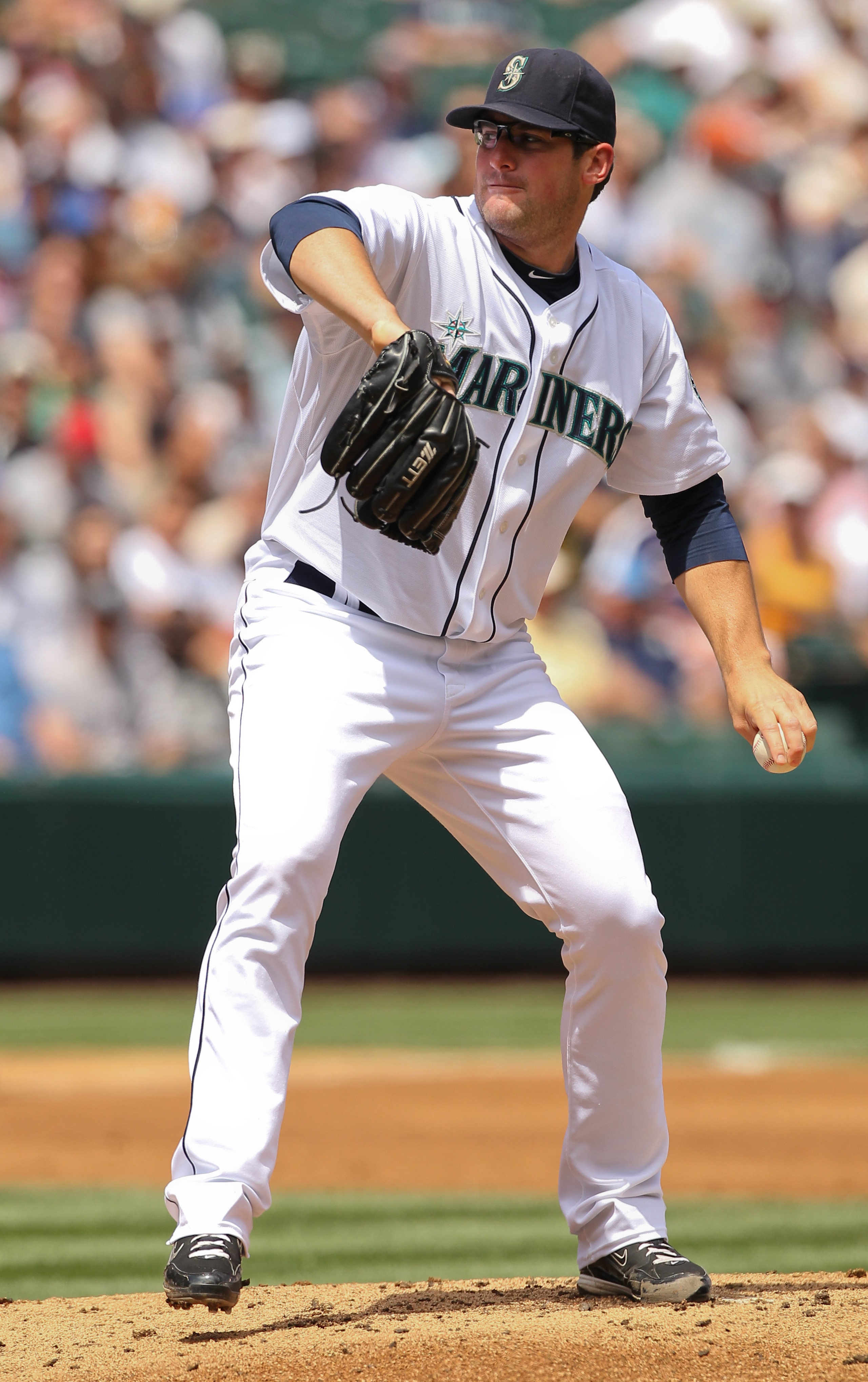 SEATTLE - JULY 11: Starting pitcher Ryan Rowland-Smith #18 of the Seattle Mariners pitches against the New York Yankees at Safeco Field on July 11, 2010 in Seattle, Washington. (Photo by Otto Greule Jr/Getty Images) SEATTLE - JULY 11: Starting pitcher Ryan Rowland-Smith #18 of the Seattle Mariners pitches against the New York Yankees at Safeco Field on July 11, 2010 in Seattle, Washington. (Photo by Otto Greule Jr/Getty Images)