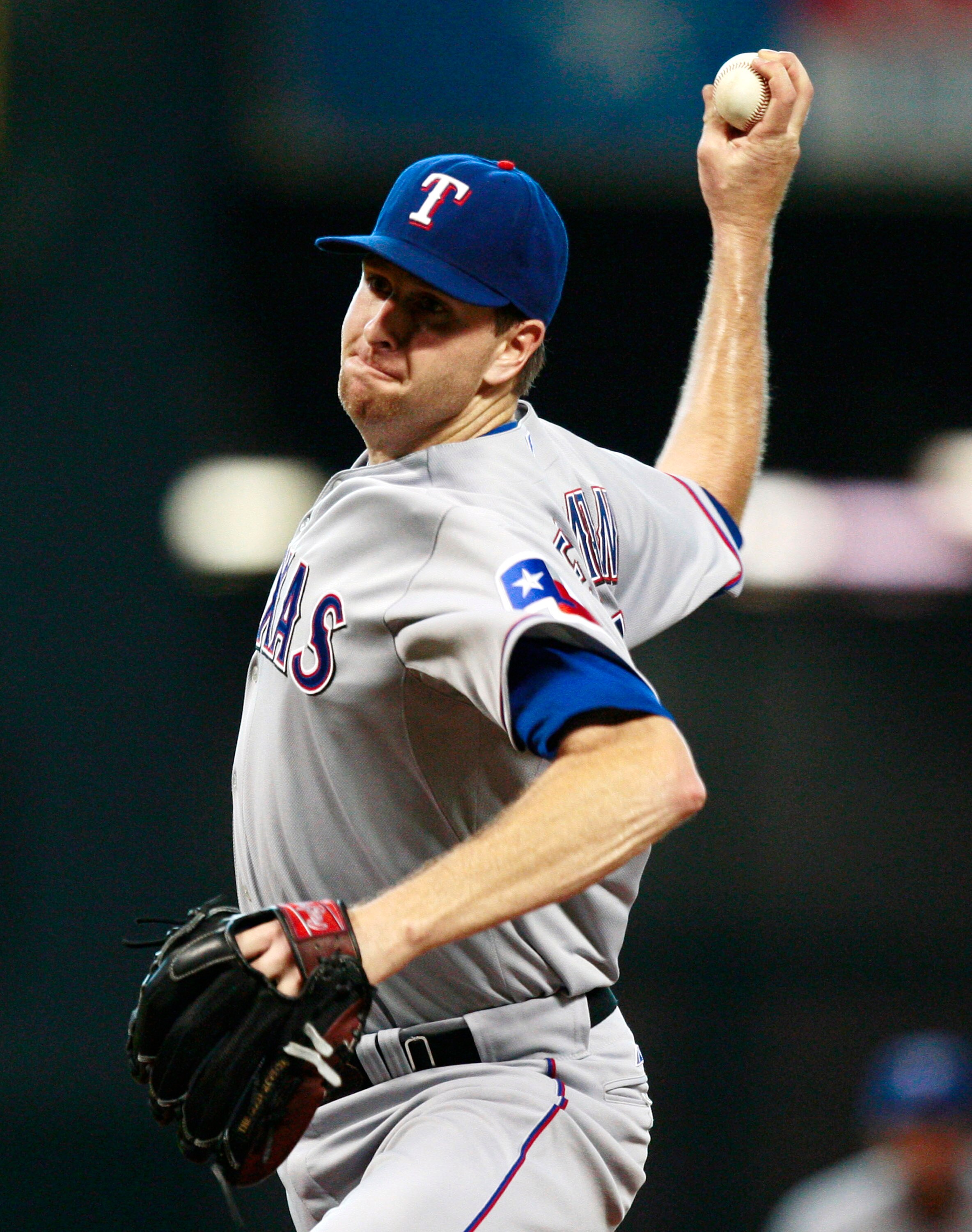 HOUSTON - JUNE 18:  Pitcher Scott Feldman #39 of the Texas Rangers throws home during the first inning against the Houston Astros at Minute Maid Park on June 18, 2010 in Houston, Texas.  (Photo by Bob Levey/Getty Images)
