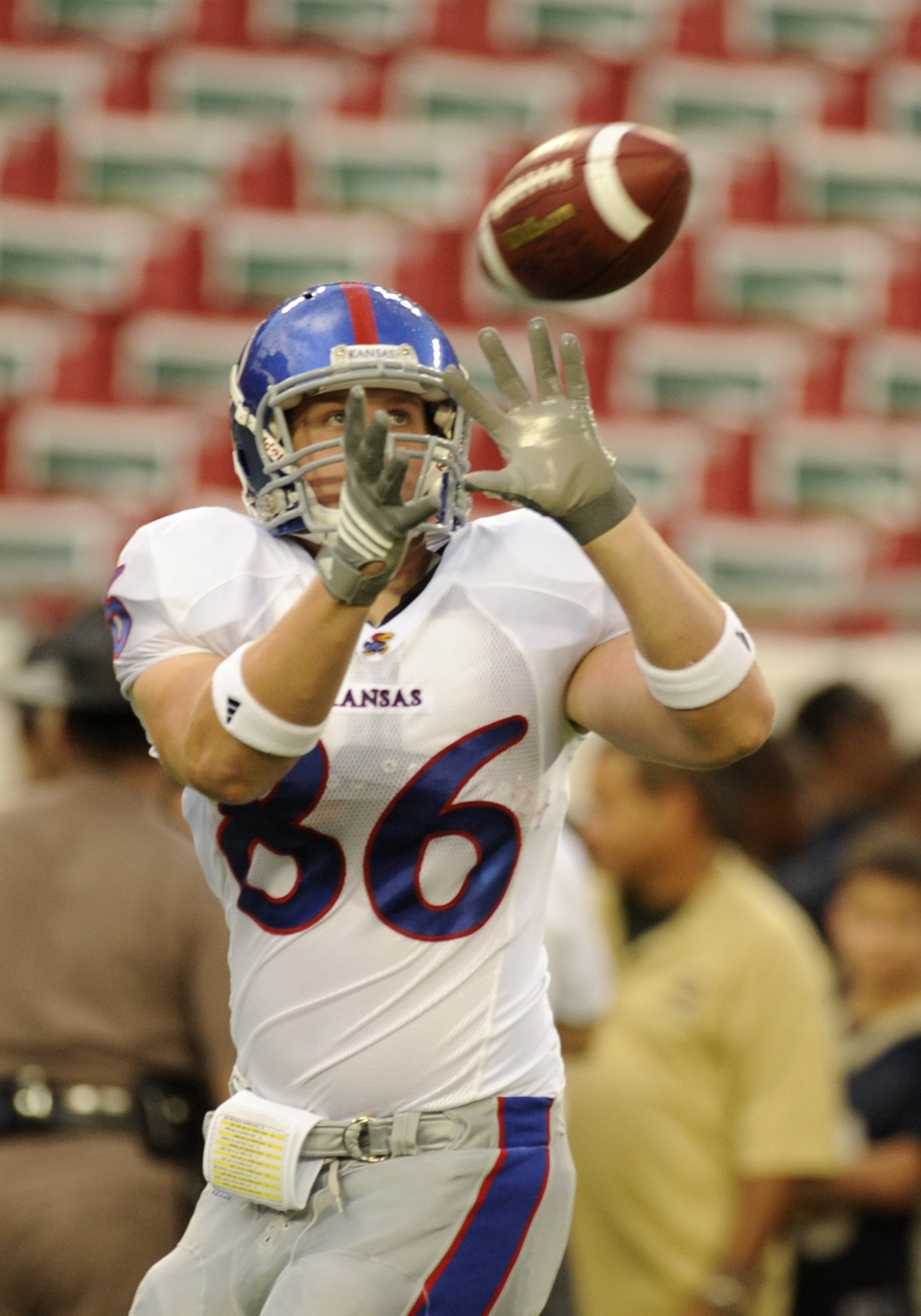 TAMPA, FL - SEPTEMBER 12: Tight end Tim Biere #86 of the Kansas University Jayhawks grabs a warmup pass before play against the University of South Florida Bulls at Raymond James Stadium on September 12, 2008 in Tampa, Florida.  (Photo by Al Messerschmidt