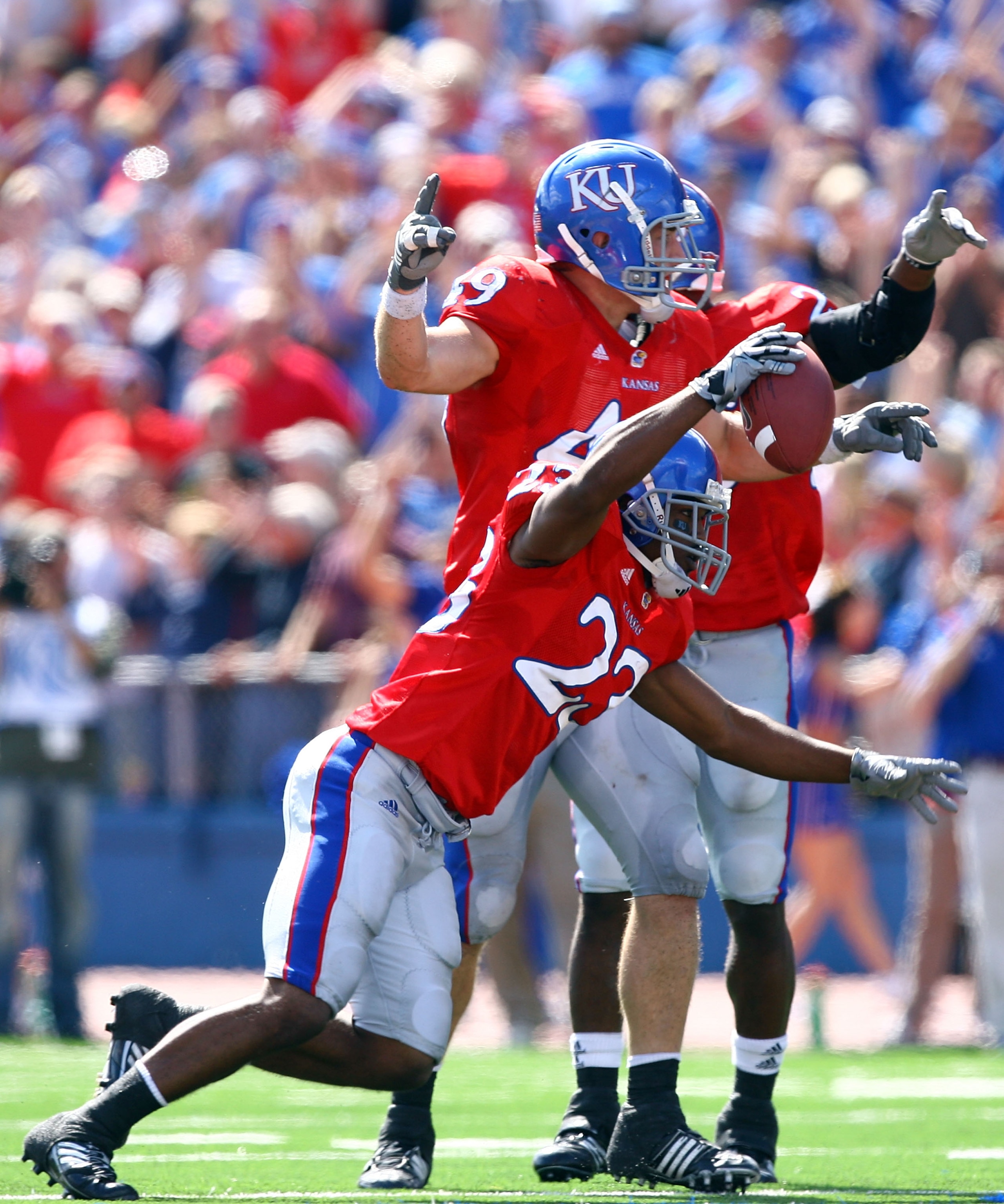 LAWRENCE, KS - SEPTEMBER 26:  Ryan Murphy #23 of the Kansas Jayhawks reacts after making an interception during the game against the Southern Mississippi Golden Eagles on September 26, 2009 at Memorial Stadium in Lawrence, Kansas.  (Photo by Jamie Squire/