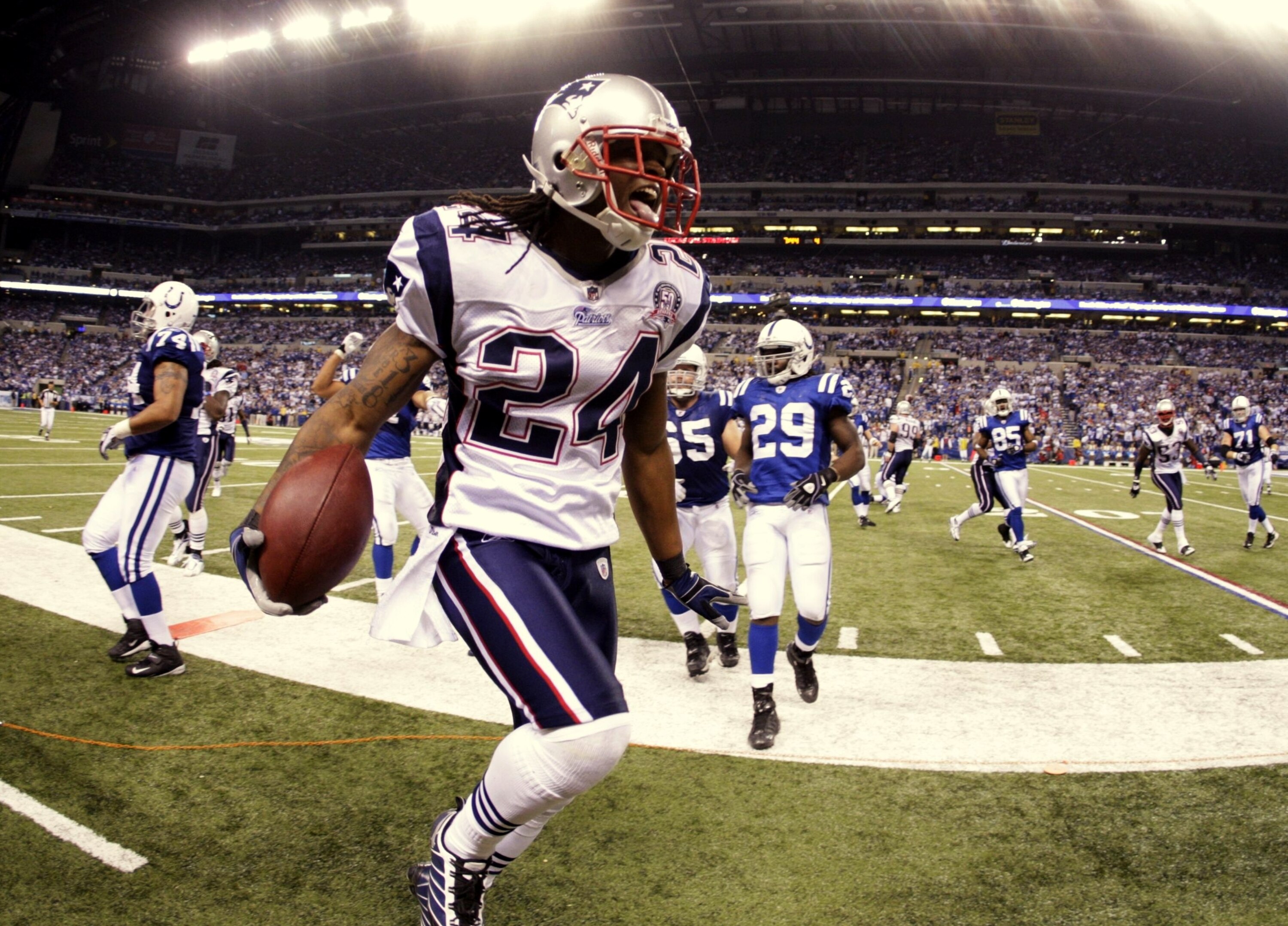 INDIANAPOLIS - NOVEMBER 15:  Jonathan Wilhite #24 of the New England Patriots celebrates an interception during the fourth quarter of the game against the Indianapolis Colts at Lucas Oil Stadium on November 15, 2009 in Indianapolis, Indiana. (Photo by Jam