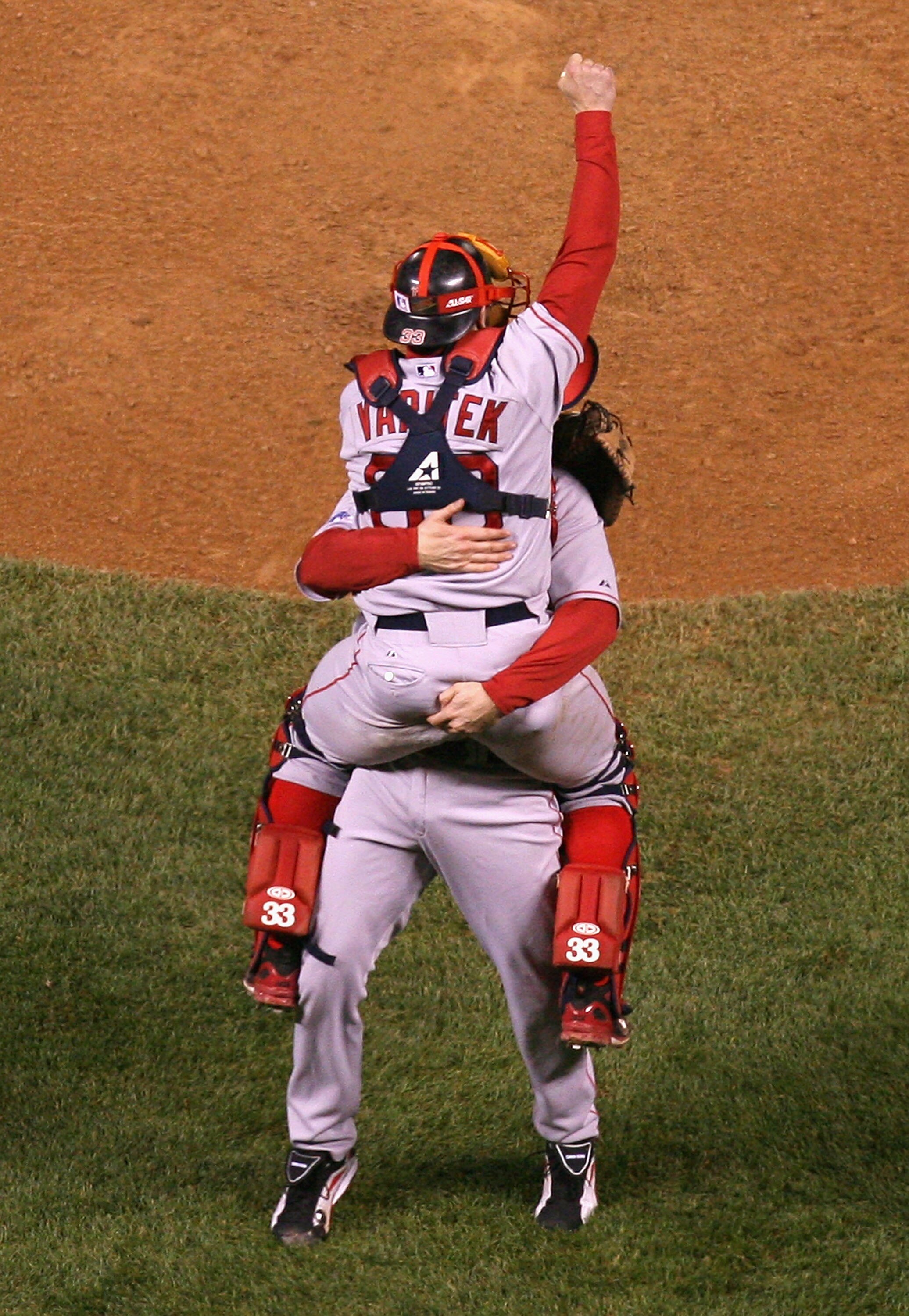 DENVER - OCTOBER 28:  Relief pitcher Jonathan Papelbon #58 of the Boston Red Sox celebrates with Jason Varitek #33 after defeating the Colorado Rockies in Game Four of the 2007 World Series at Coors Field on October 28, 2007 in Denver, Colorado  The Red S