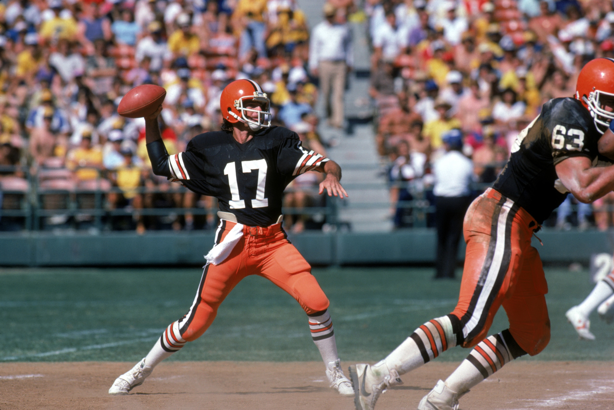 SAN DIEGO - SEPTEMBER 25: Quarterback Brian Sipe #17 of the Cleveland Browns throws a pass under the protection of offensive tackle Cody Risien #63 during a game against the San Diego Chargers at Jack Murphy on September 25, 1983 in San Diego, California SAN DIEGO - SEPTEMBER 25: Quarterback Brian Sipe #17 of the Cleveland Browns throws a pass under the protection of offensive tackle Cody Risien #63 during a game against the San Diego Chargers at Jack Murphy on September 25, 1983 in San Diego, California