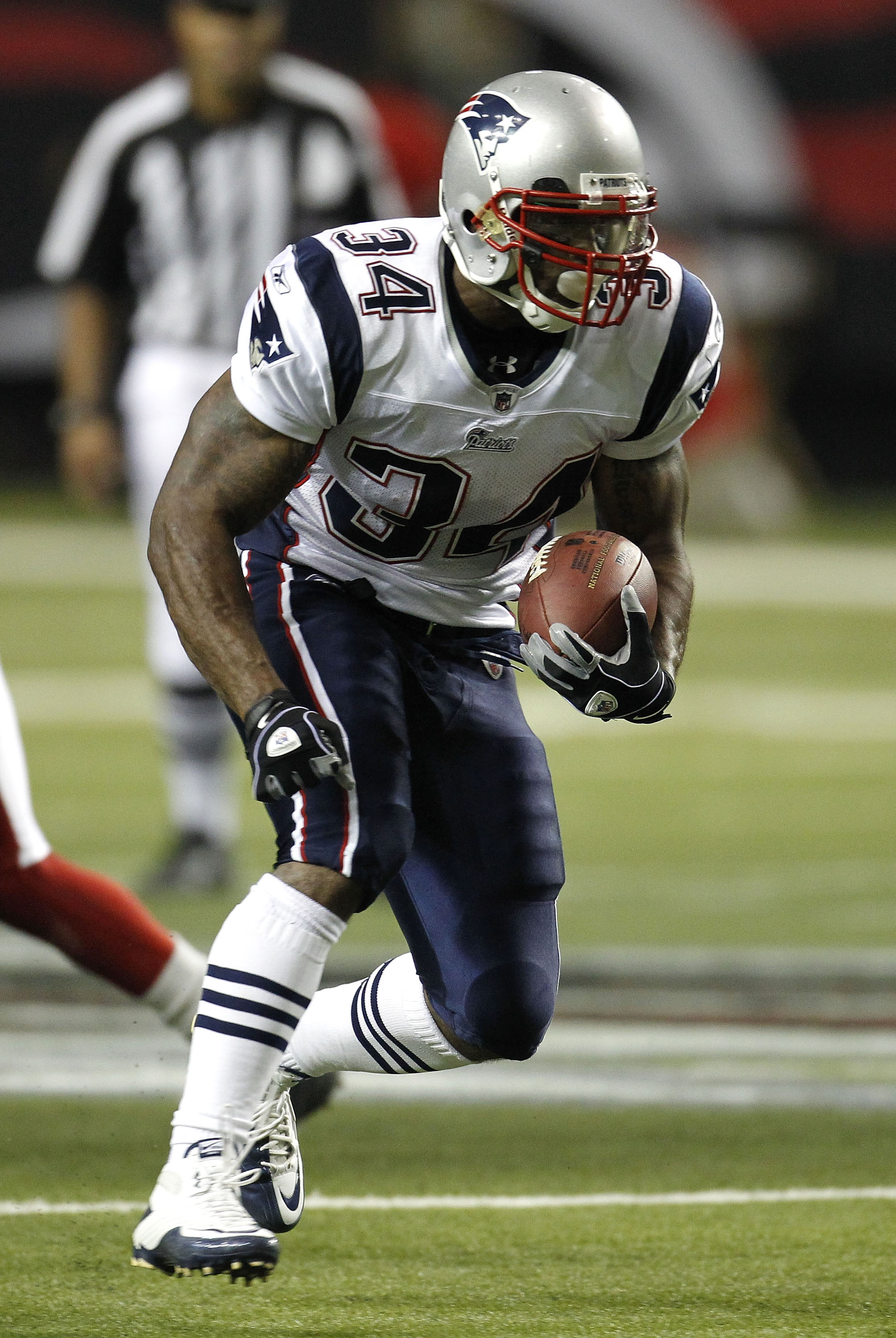 ATLANTA - AUGUST 19:  Running Sammy Morris #34 of the New England Patriots runs with the ball during the preseason game against the Atlanta Falcons at the Georgia Dome on August 19, 2010 in Atlanta, Georgia.  The Patriots beat the Falcons 28-10.  (Photo b