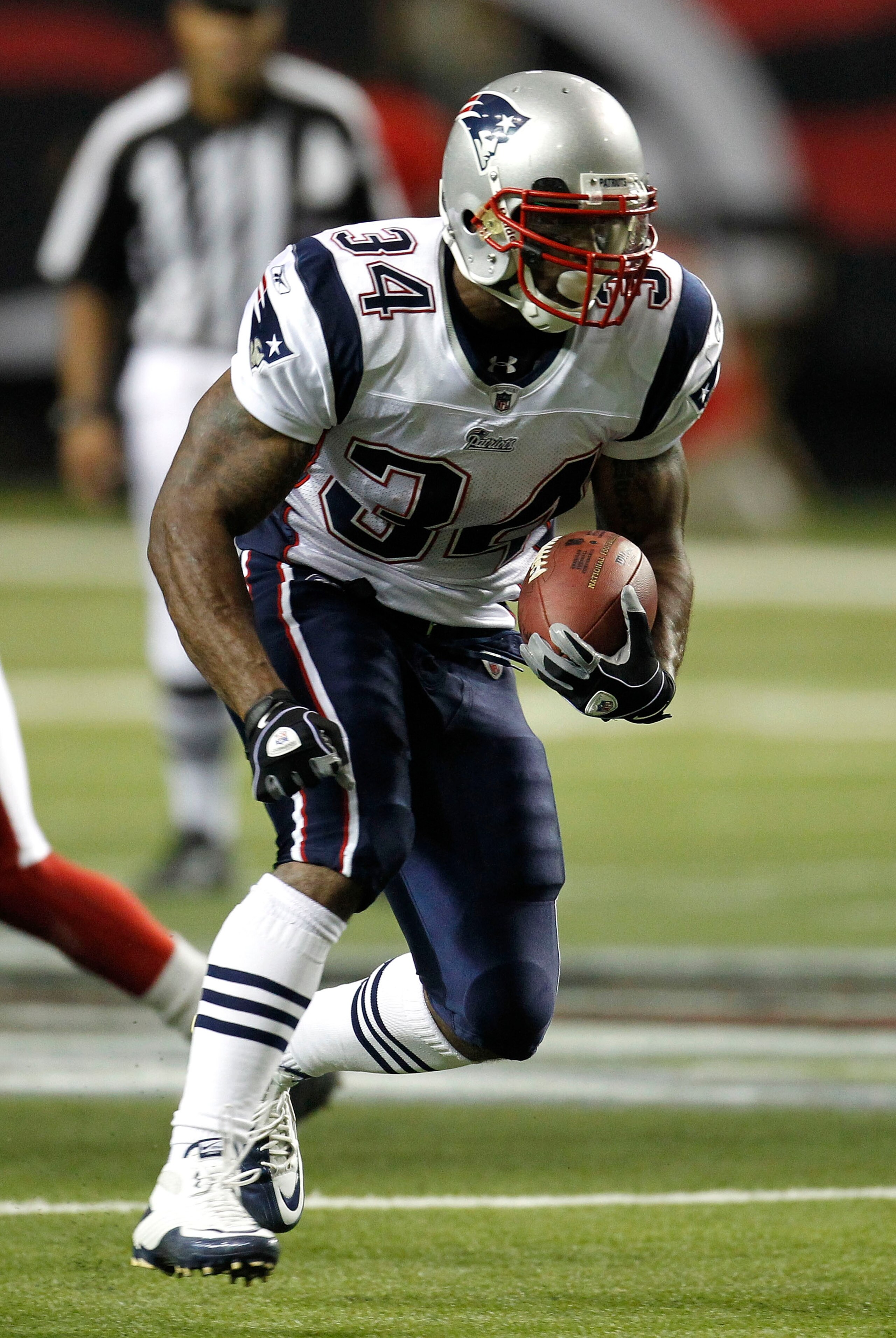 ATLANTA - AUGUST 19:  Running Sammy Morris #34 of the New England Patriots runs with the ball during the preseason game against the Atlanta Falcons at the Georgia Dome on August 19, 2010 in Atlanta, Georgia.  The Patriots beat the Falcons 28-10.  (Photo b