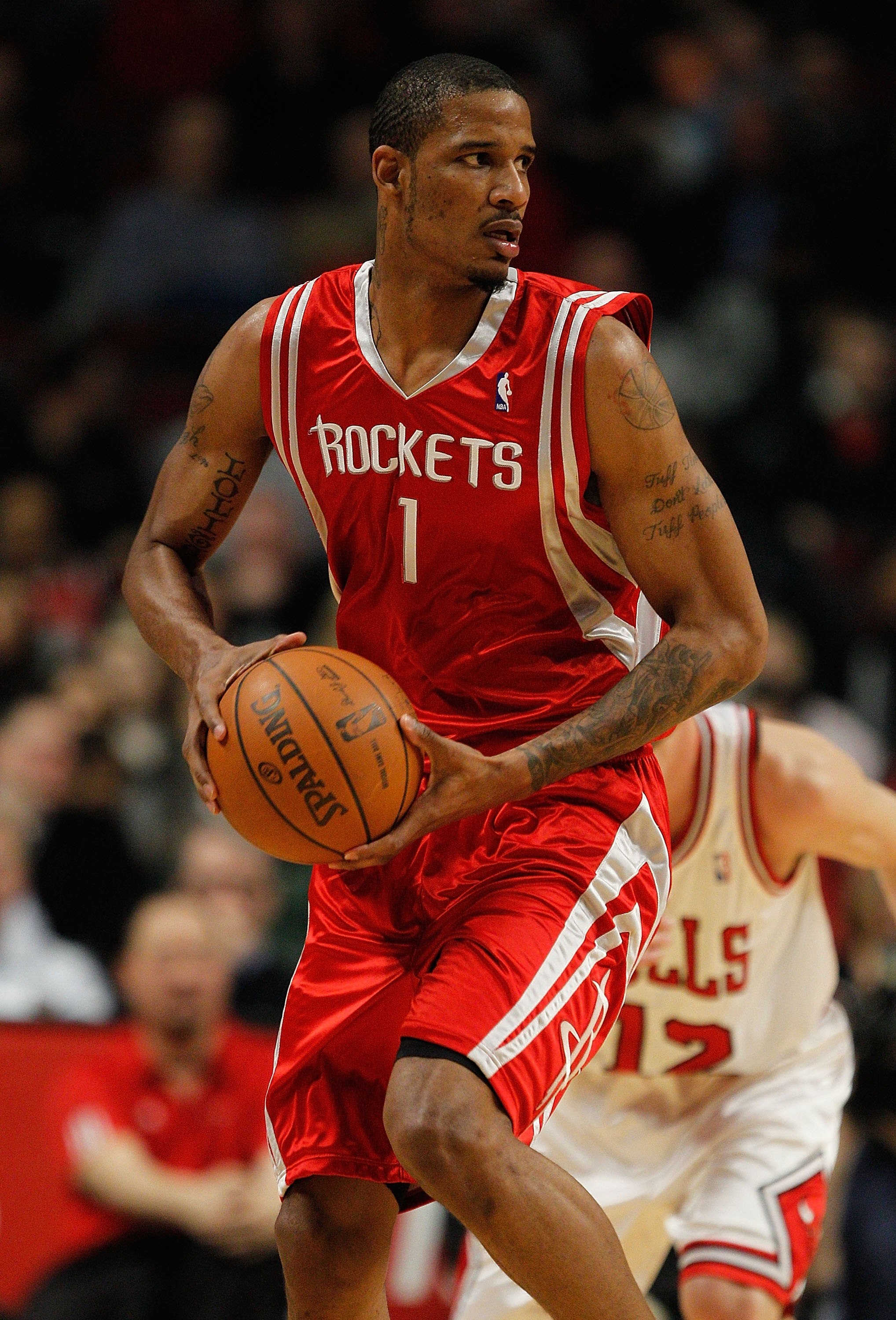 CHICAGO - MARCH 22: Trevor Ariza #1 of the Houston Rockets looks to pass against the Chicago Bulls at the United Center on March 22, 2010 in Chicago, Illinois. The Bulls defeated the Rockets 98-88. NOTE TO USER: User expressly acknowledges and agrees that