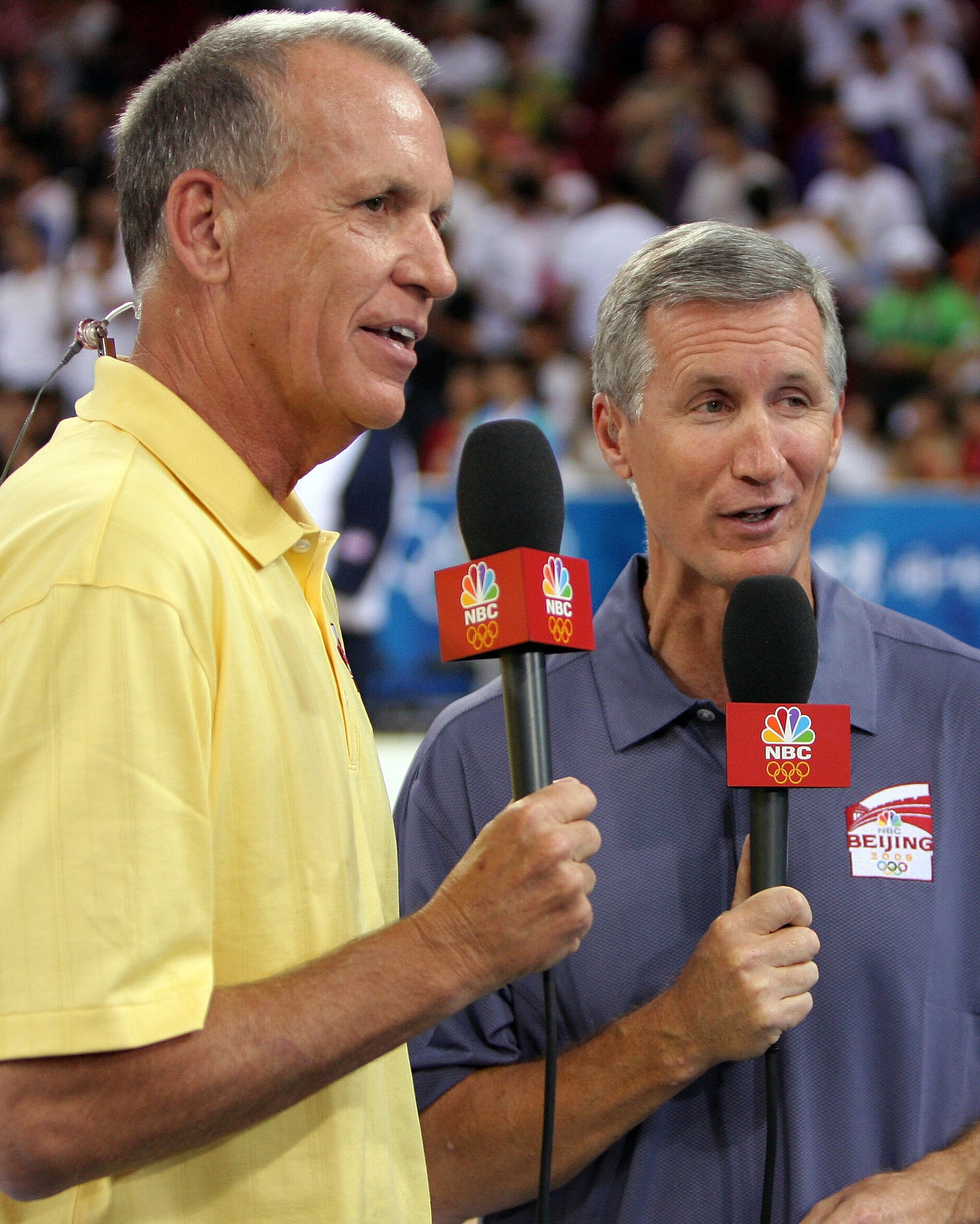 BEIJING - AUGUST 16:  (L-R) Doug Collins and Mike Breen of NBC Sports talk on the air before the United Sates men's basketball team takes on Spain during the group B preliminary basketball game at the Beijing Olympic Basketball Gymnasium on Day 8 of the B