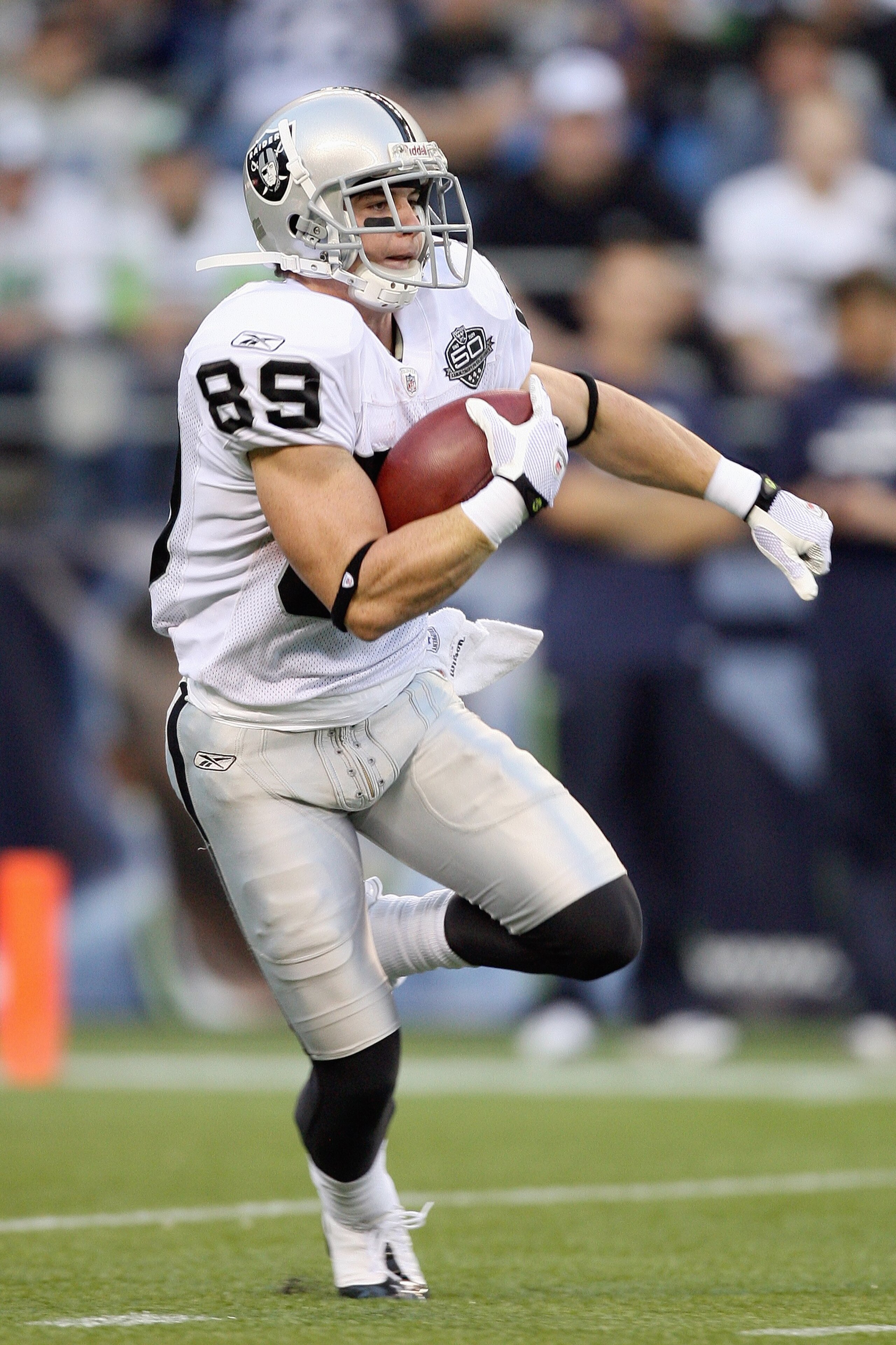 SEATTLE - SEPTEMBER 03: Nick Miller #89 of the Oakland Raiders runs the ball during the game against the Seattle Seahawks on September 3, 2009 at Qwest Field in Seattle, Washington. (Photo by Otto Greule Jr/Getty Images)