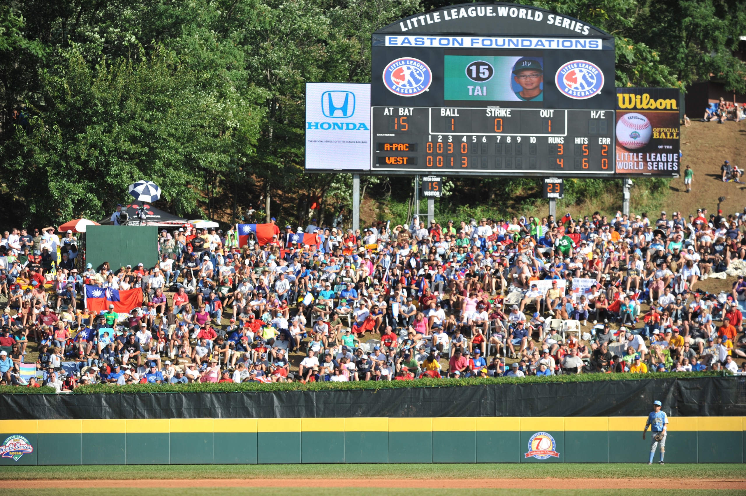 WILLIAMSPORT, PA - AUGUST 30: Fans of the little league world series watch the game between California (Chula Vista)and Asia Pacific (Taoyuan, Taiwan) in the little league world series final at Lamade Stadium on August 30, 2009 in Williamsport, Pennsylvan