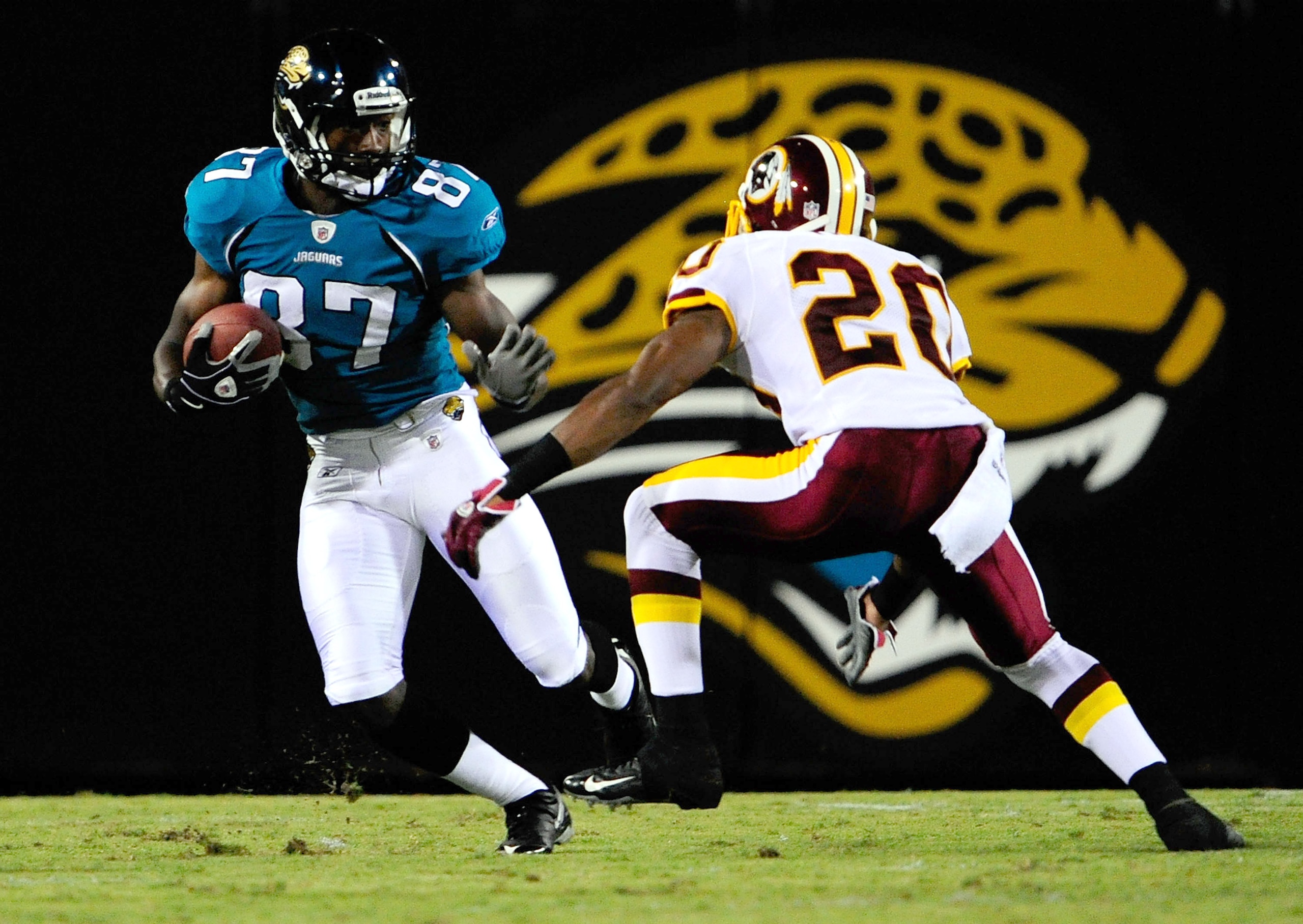 JACKSONVILLE, FL - SEPTEMBER 03: Jarett Dillard #87 of the Jacksonville Jaguars attempts to run past Justin Tryon #20 of the Washington Redskins during the game at Jacksonville Municipal Stadium on September 3, 2009 in Jacksonville, Florida. (Photo by S JACKSONVILLE, FL - SEPTEMBER 03: Jarett Dillard #87 of the Jacksonville Jaguars attempts to run past Justin Tryon #20 of the Washington Redskins during the game at Jacksonville Municipal Stadium on September 3, 2009 in Jacksonville, Florida. (Photo by S