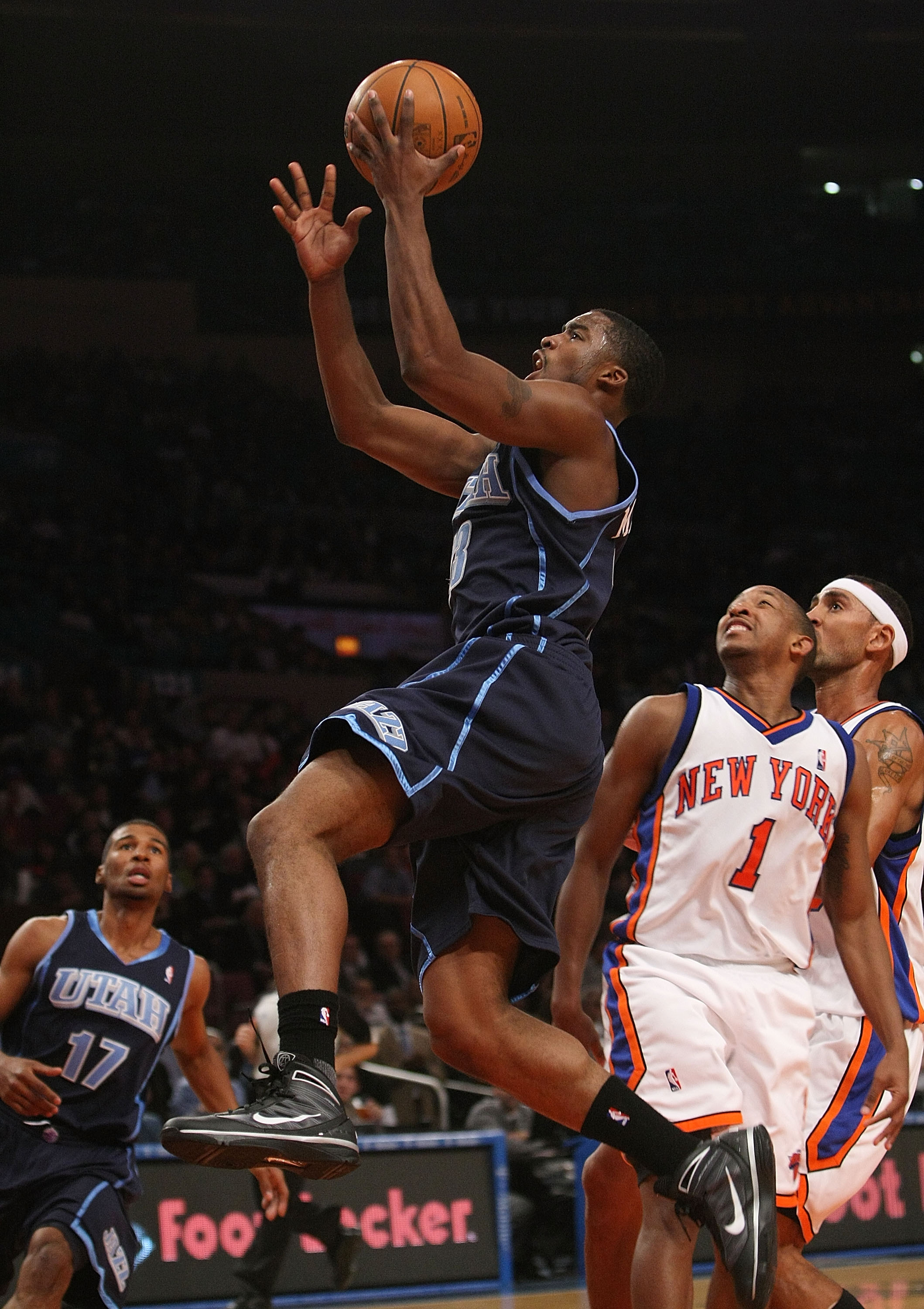 NEW YORK - NOVEMBER 09:  Wes Matthews #23 of  the Utah Jazz lays the ball up against the New York Knicks at Madison Square Garden on November 9, 2009 in New York City. NOTE TO USER: User expressly acknowledges and agrees that, by downloading and or using