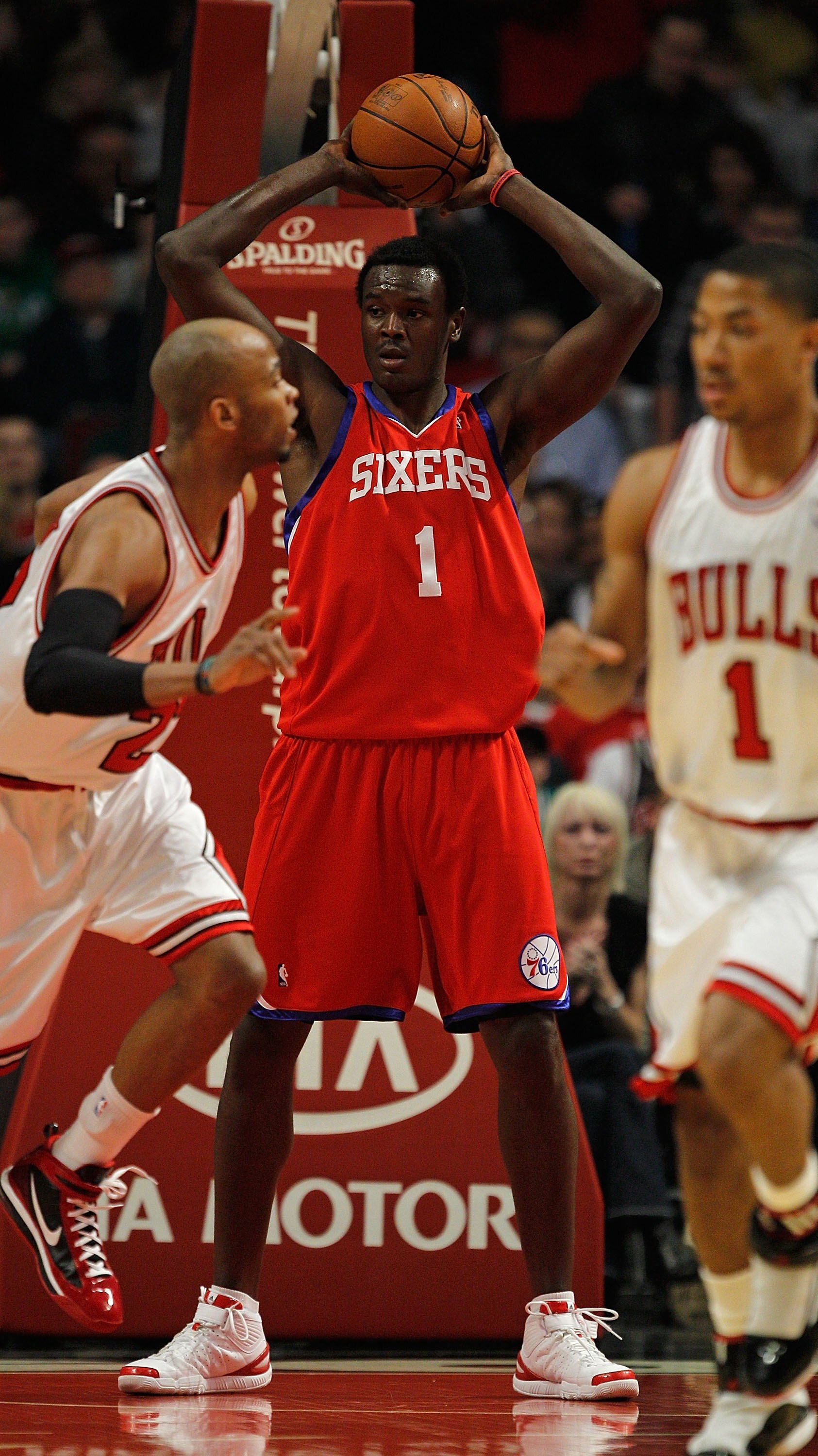CHICAGO - FEBRUARY 20: Samuel Dalembert #1 of the Philadelphia 76ers looks to pass after grabbing a rebound against the Chicago Bulls at the United Center on February 20, 2010 in Chicago, Illinois. The Bulls defeated the 76ers 122-90. NOTE TO USER: User e