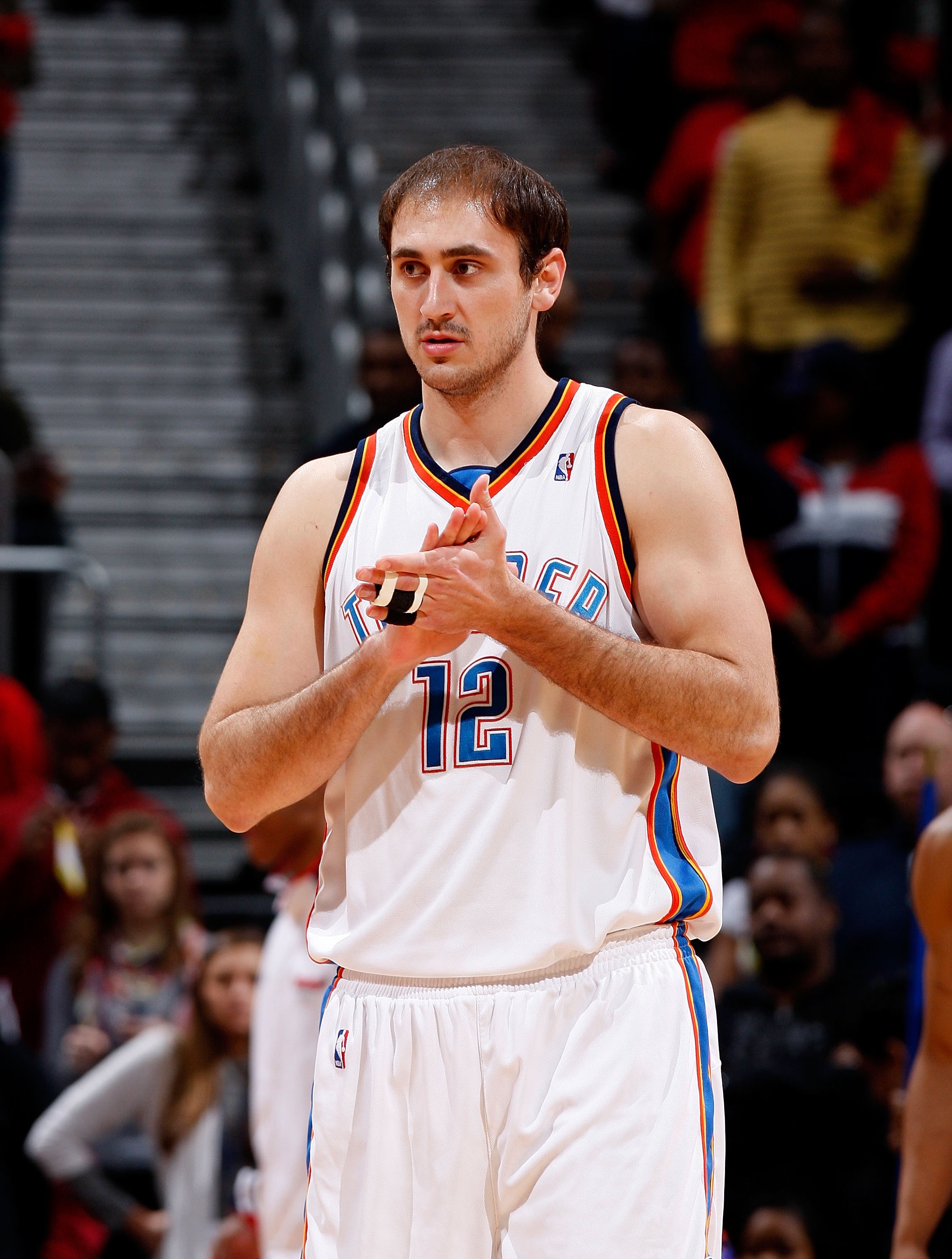 ATLANTA - JANUARY 18:  Nenad Krstic #12 of the Oklahoma City Thunder against the Atlanta Hawks at Philips Arena on January 18, 2010 in Atlanta, Georgia.  NOTE TO USER: User expressly acknowledges and agrees that, by downloading and/or using this Photograp