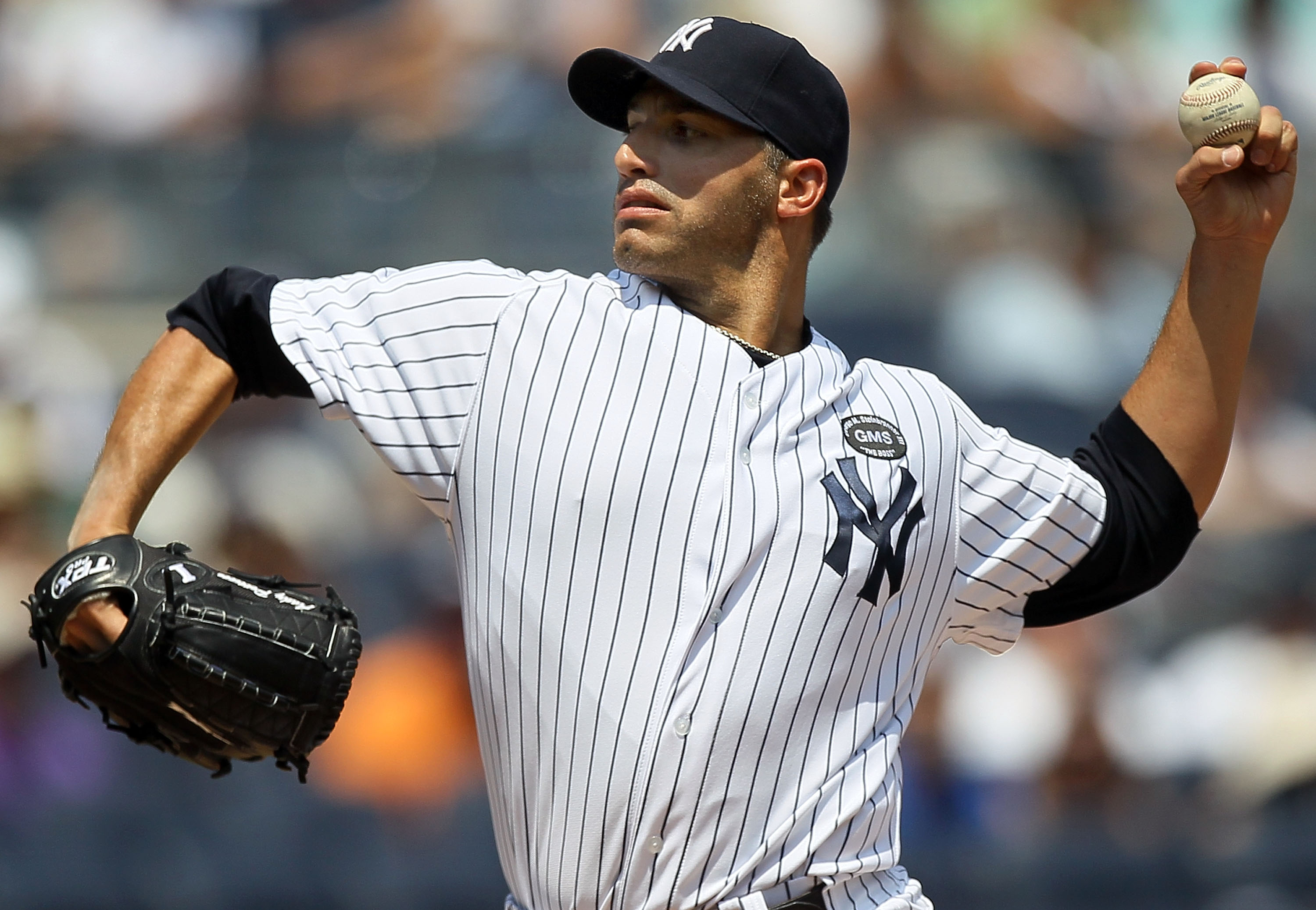 NEW YORK - JULY 18:  Andy Pettitte #46 of the New York Yankees delivers a pitch against the Tampa Bay Rays on July 18, 2010 at Yankee Stadium in the Bronx borough of New York City.  (Photo by Jim McIsaac/Getty Images)