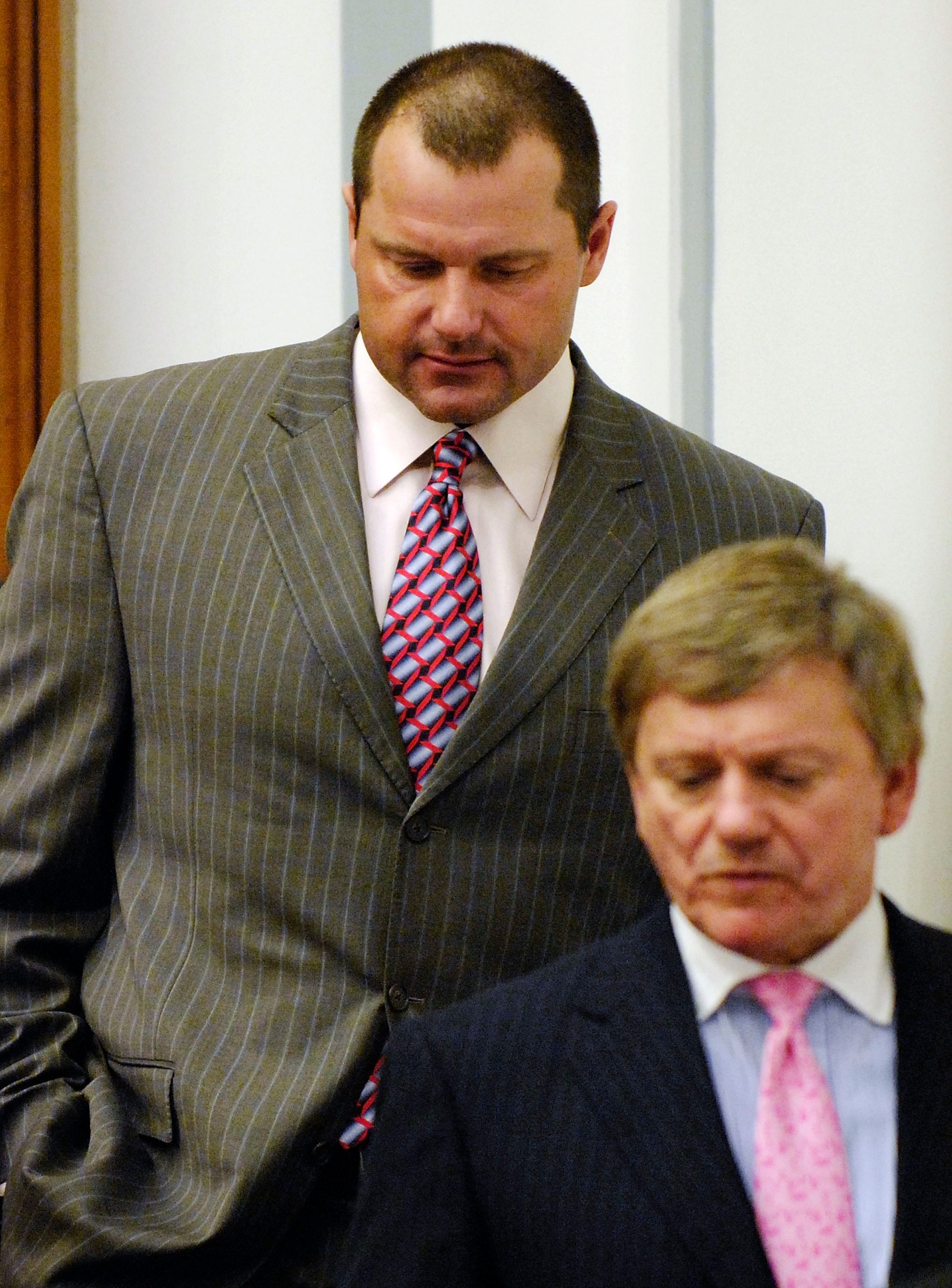 WASHINGTON - FEBRUARY 05:  Former New York Yankees pitcher Roger Clemens (R) departs with his attorneys Rusty Hardin (C) and Lanny Breuer (L),  after being deposed by the House Oversight and Government Reform Committee about steroid use in Major League Ba